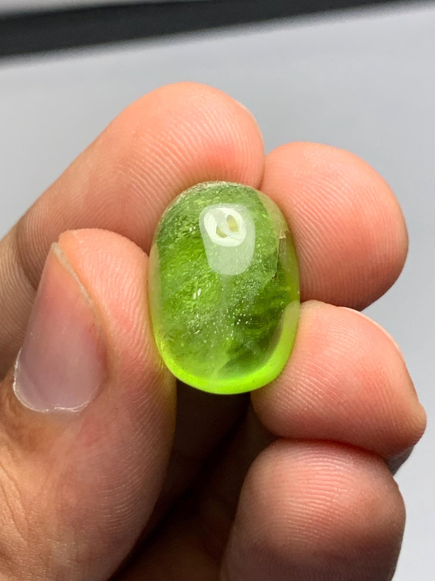 Peridot cabochon 24 carat 19*13*10mm