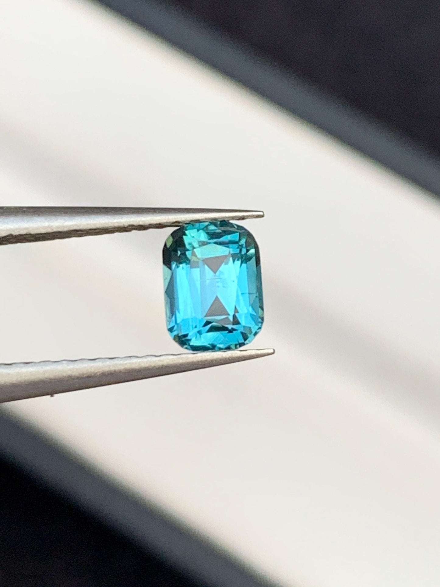 75 cent faceted neon blue tourmaline 6*5*4mm