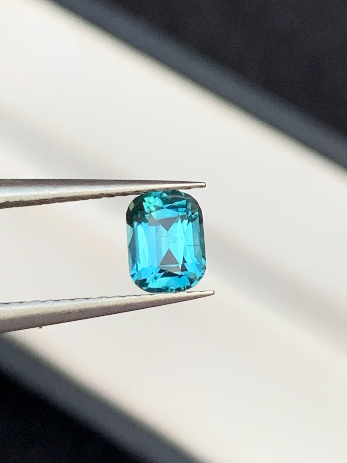 75 cent faceted neon blue tourmaline 6*5*4mm