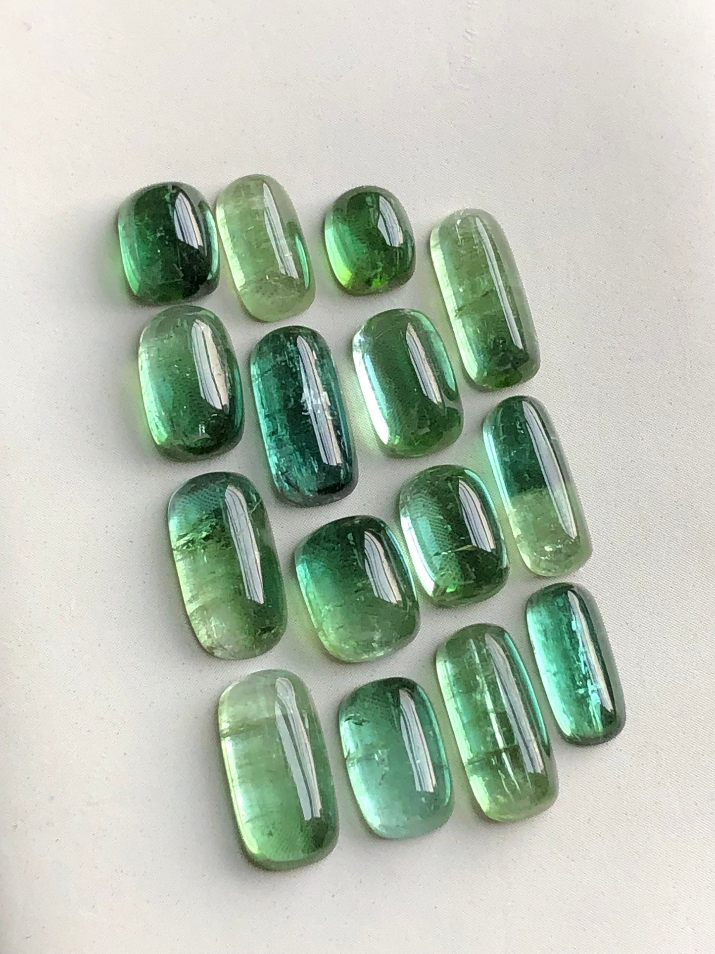 Natural bluish green tourmaline cabochons lot 31.40 carats