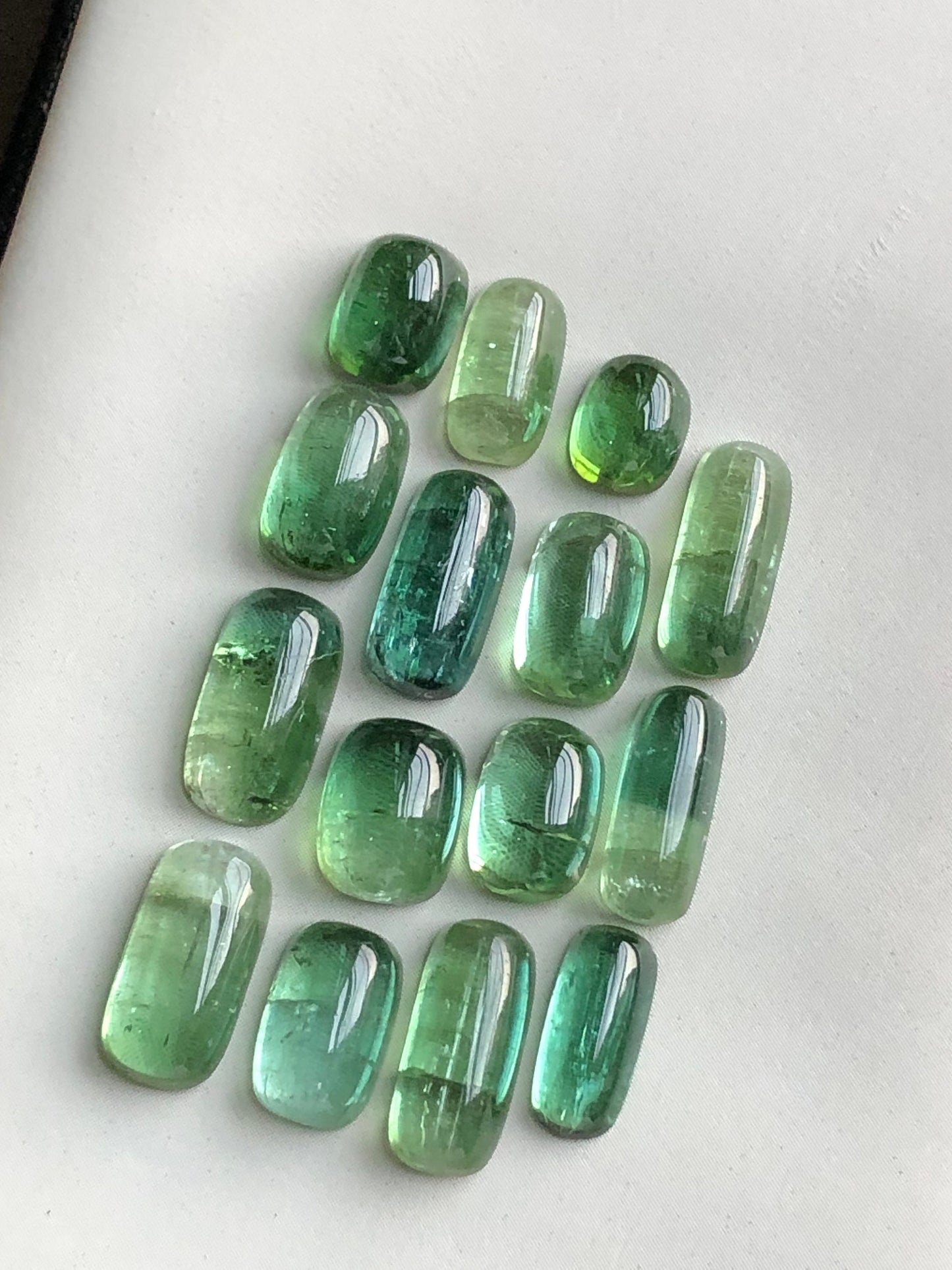 Natural bluish green tourmaline cabochons lot 31.40 carats