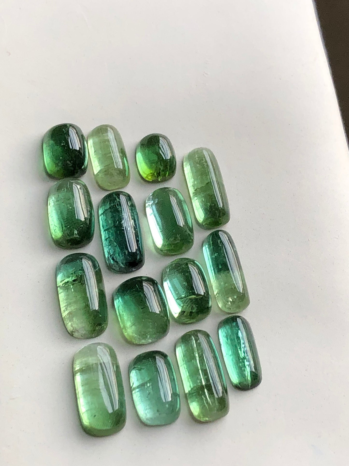 Natural bluish green tourmaline cabochons lot 31.40 carats