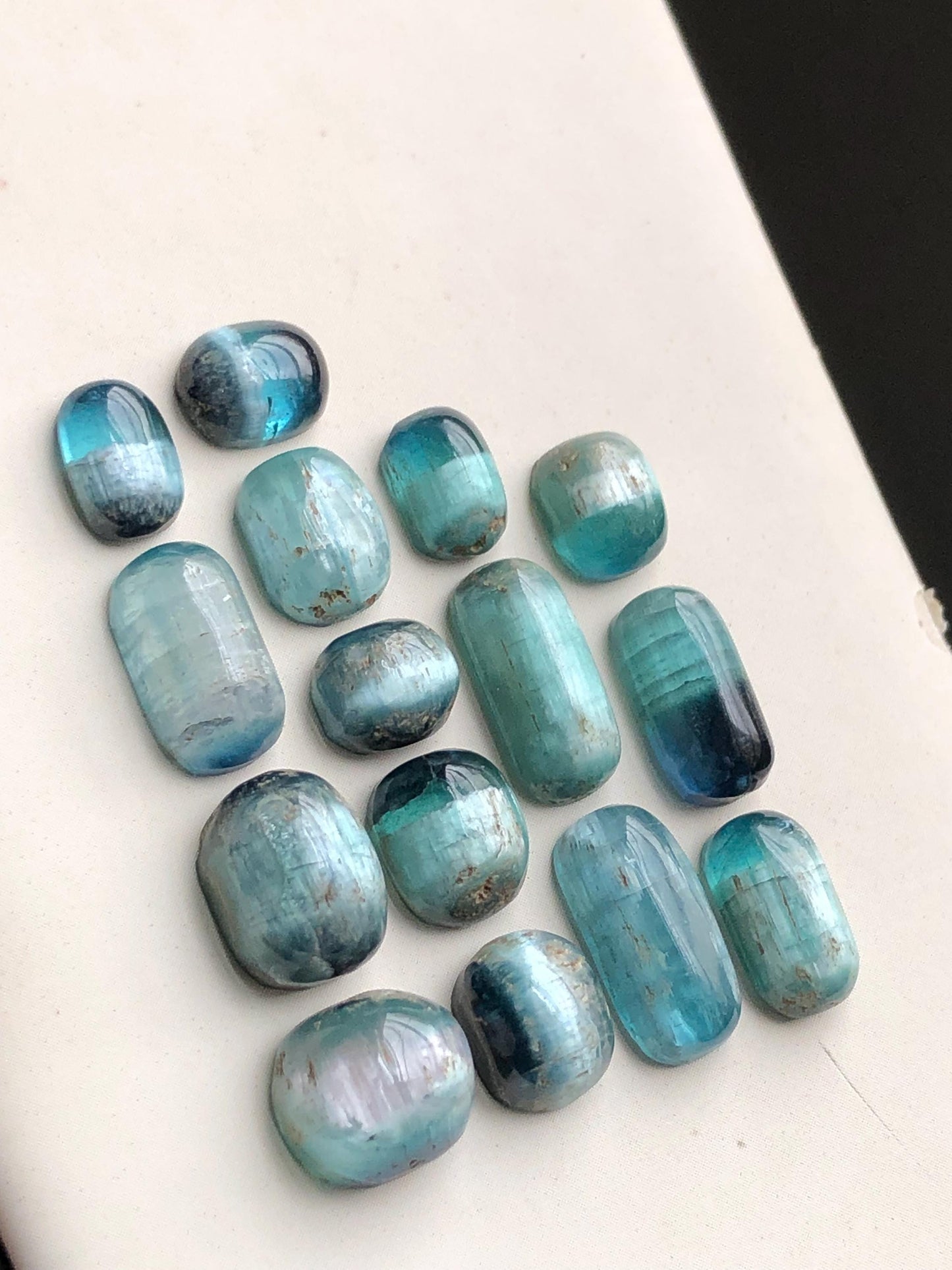 46 Cats eye tourmaline cabochons lot