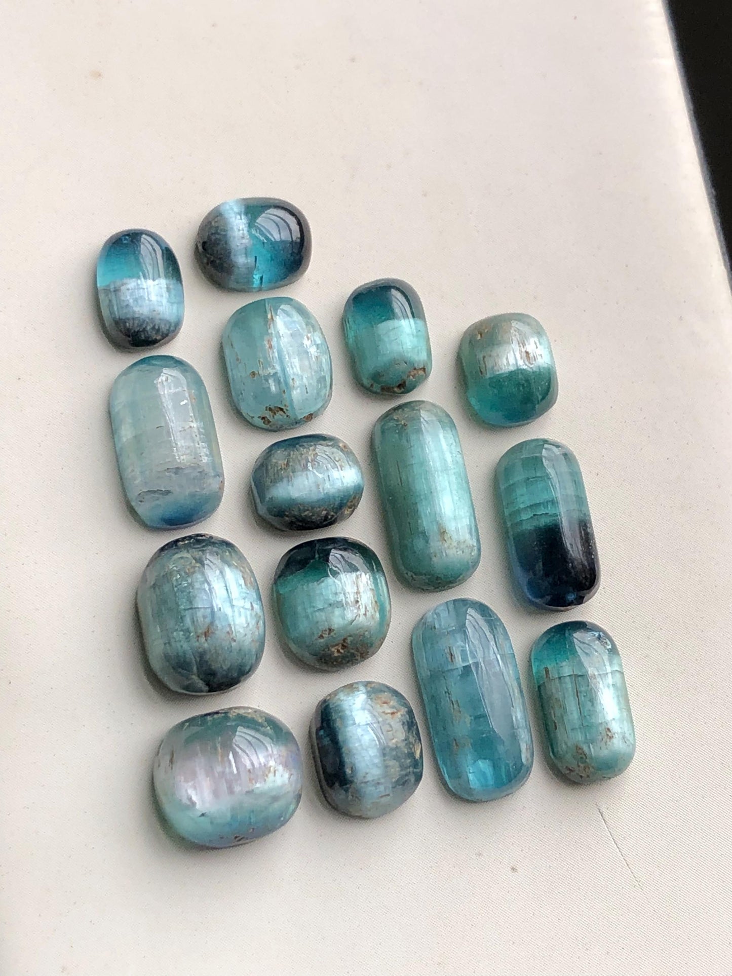 46 Cats eye tourmaline cabochons lot