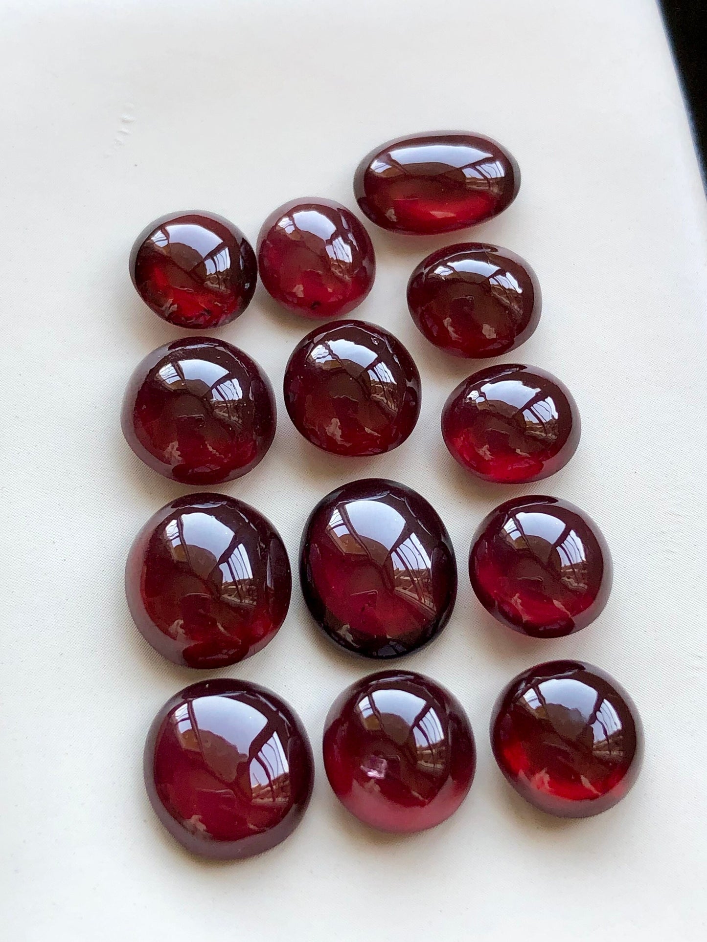 76.55 carats natural rhodolite garnet cabochons available