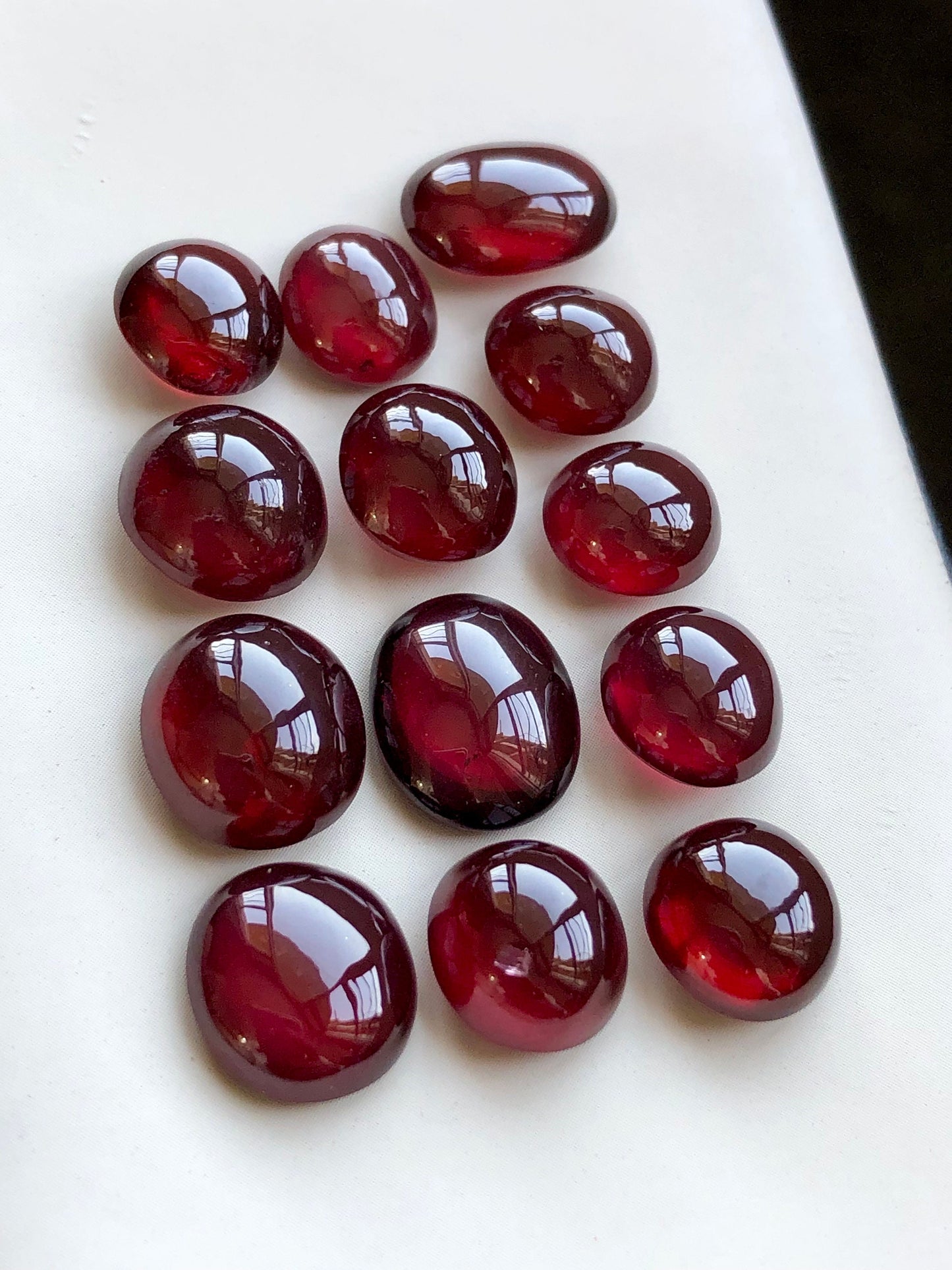 76.55 carats natural rhodolite garnet cabochons available