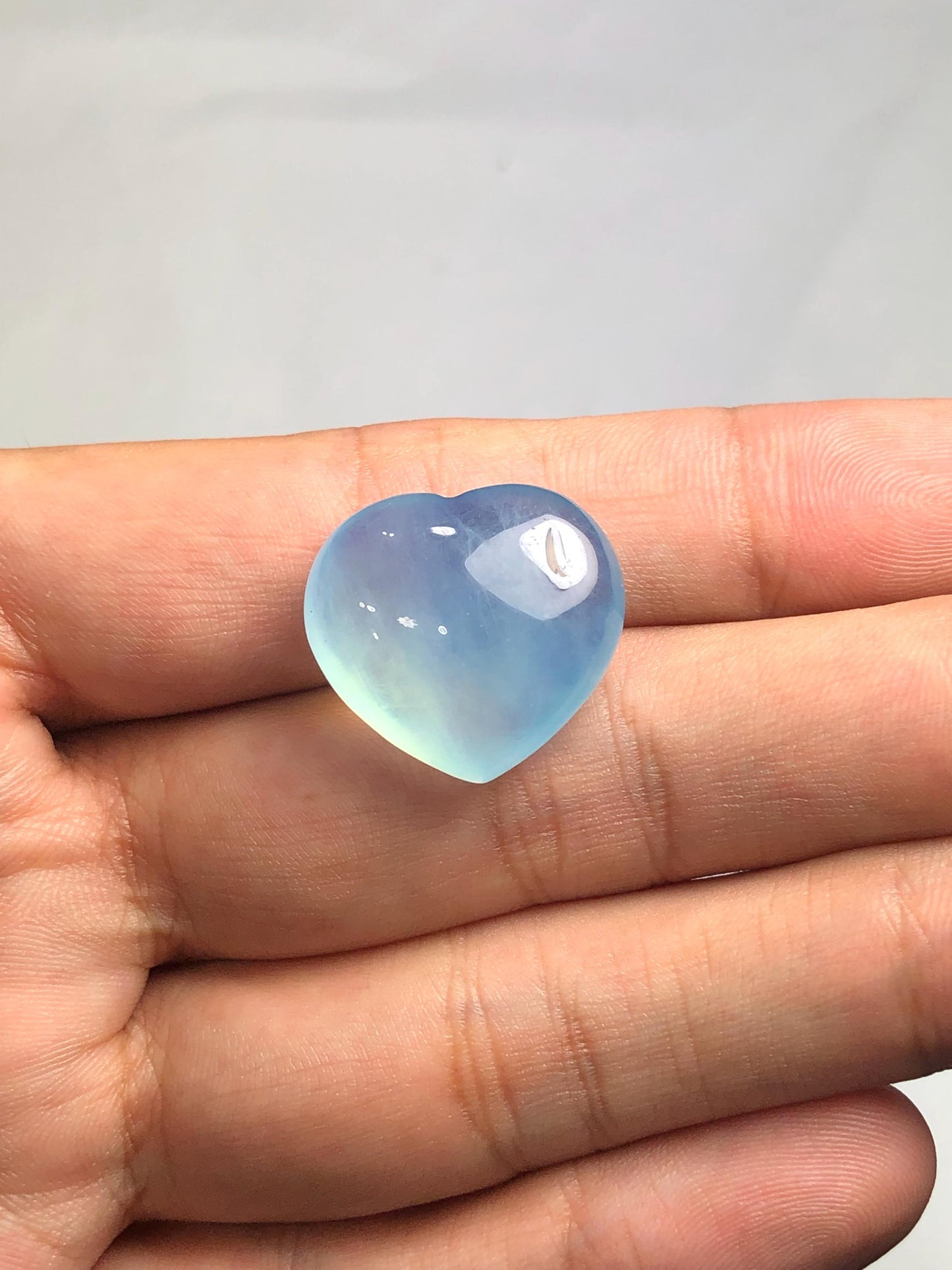 30.70 ct heart shape aquamarine cabochon heated