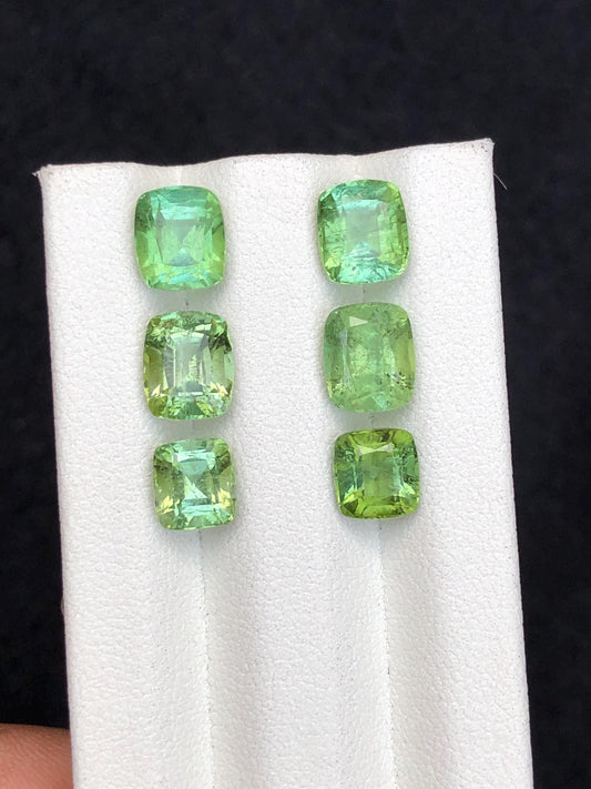 Faceted green tourmaline pairs