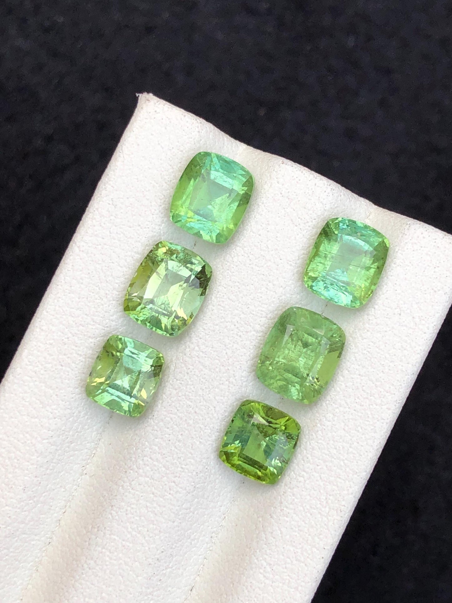 Faceted green tourmaline pairs