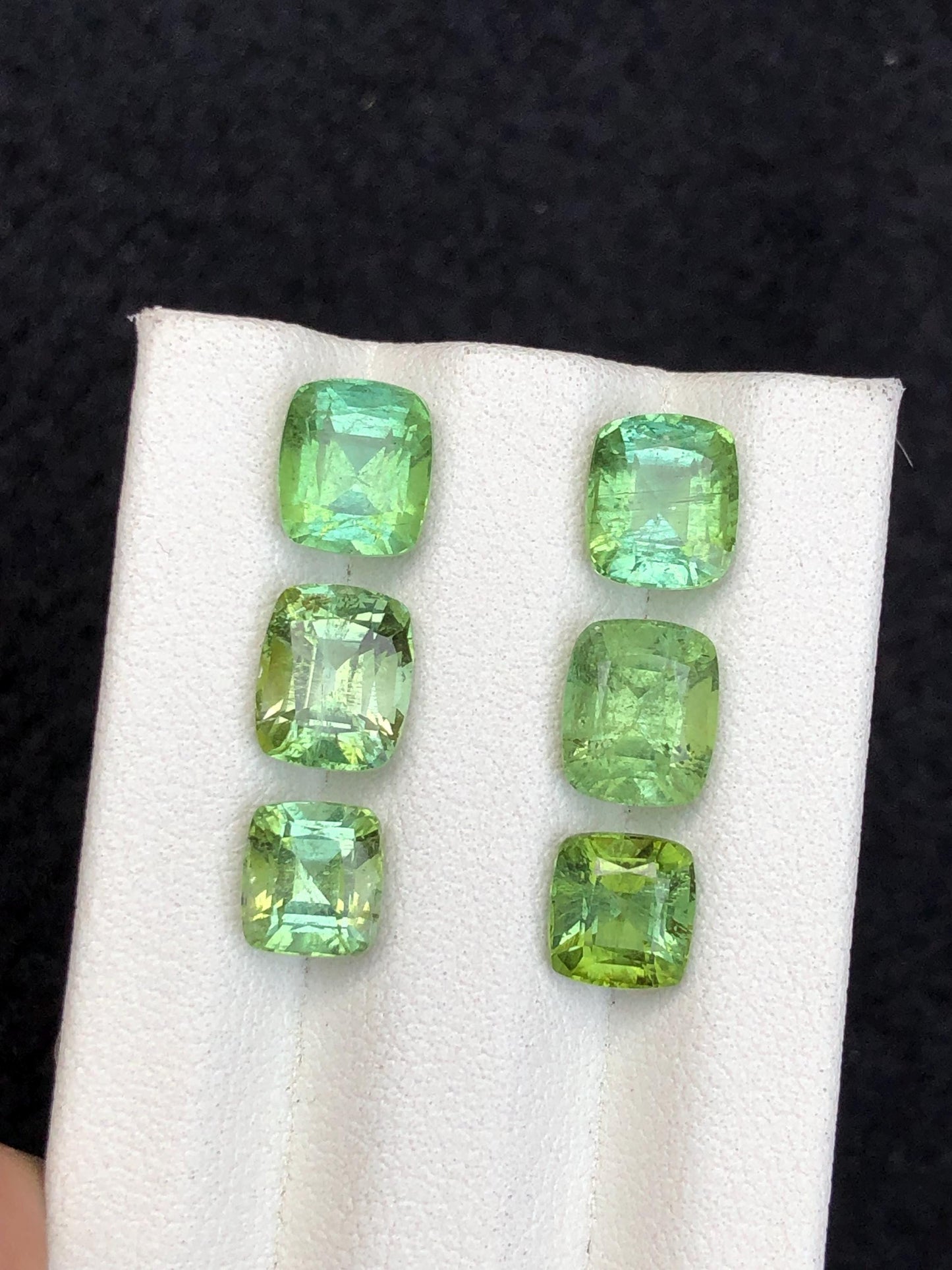 Faceted green tourmaline pairs