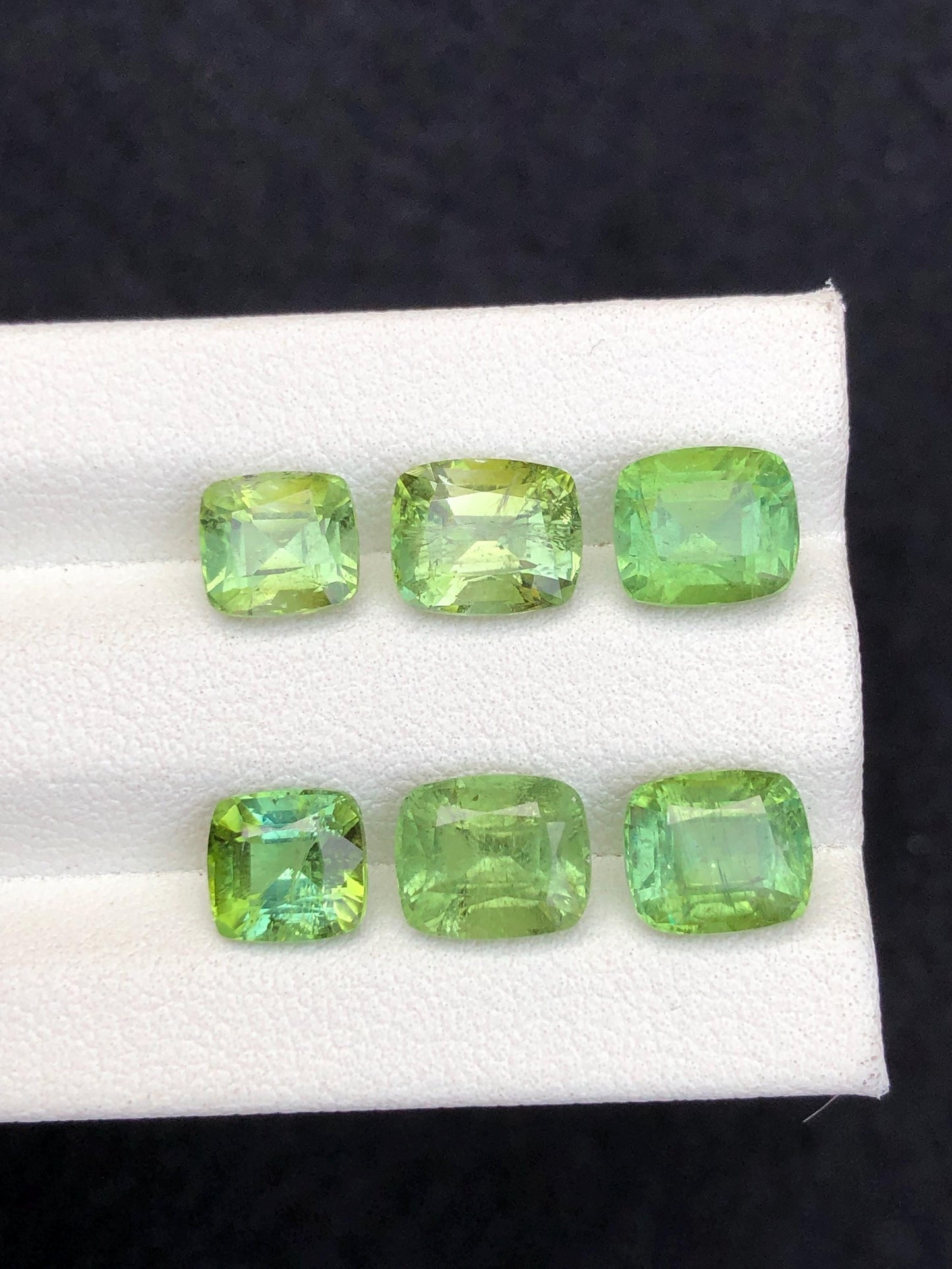 Faceted green tourmaline pairs