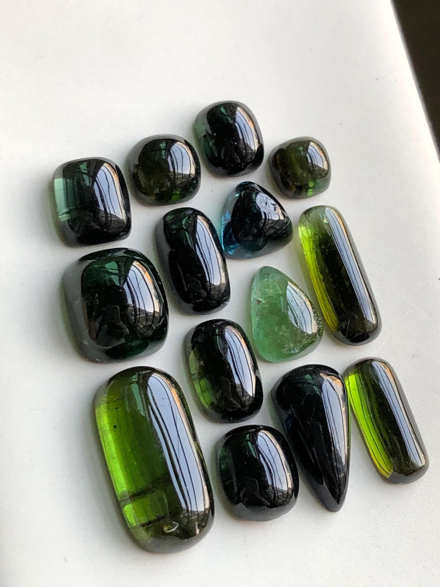 55.90 carats Dark green tourmaline cabochons lot