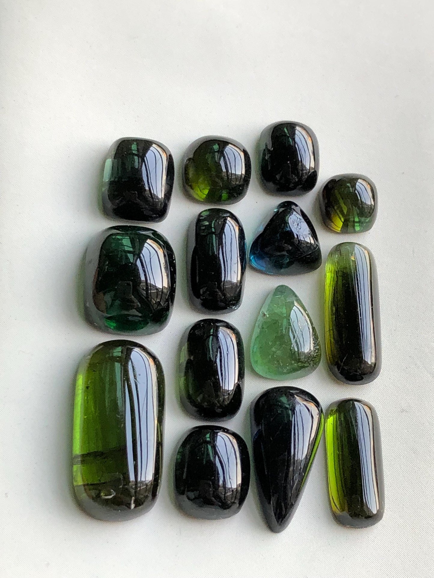 55.90 carats Dark green tourmaline cabochons lot