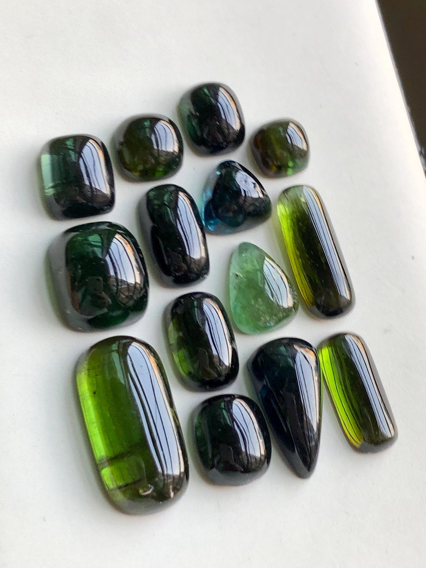 55.90 carats Dark green tourmaline cabochons lot