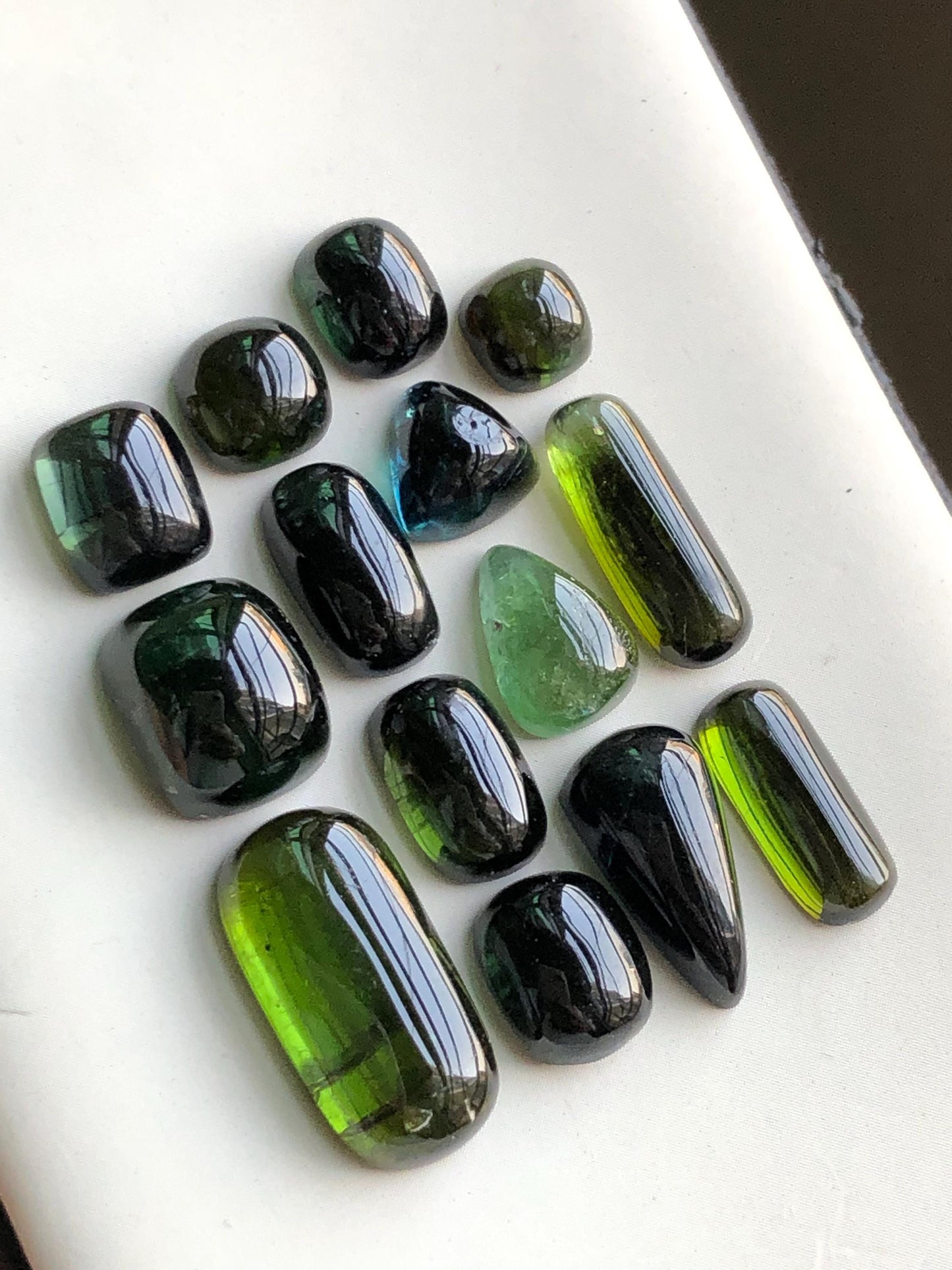 55.90 carats Dark green tourmaline cabochons lot