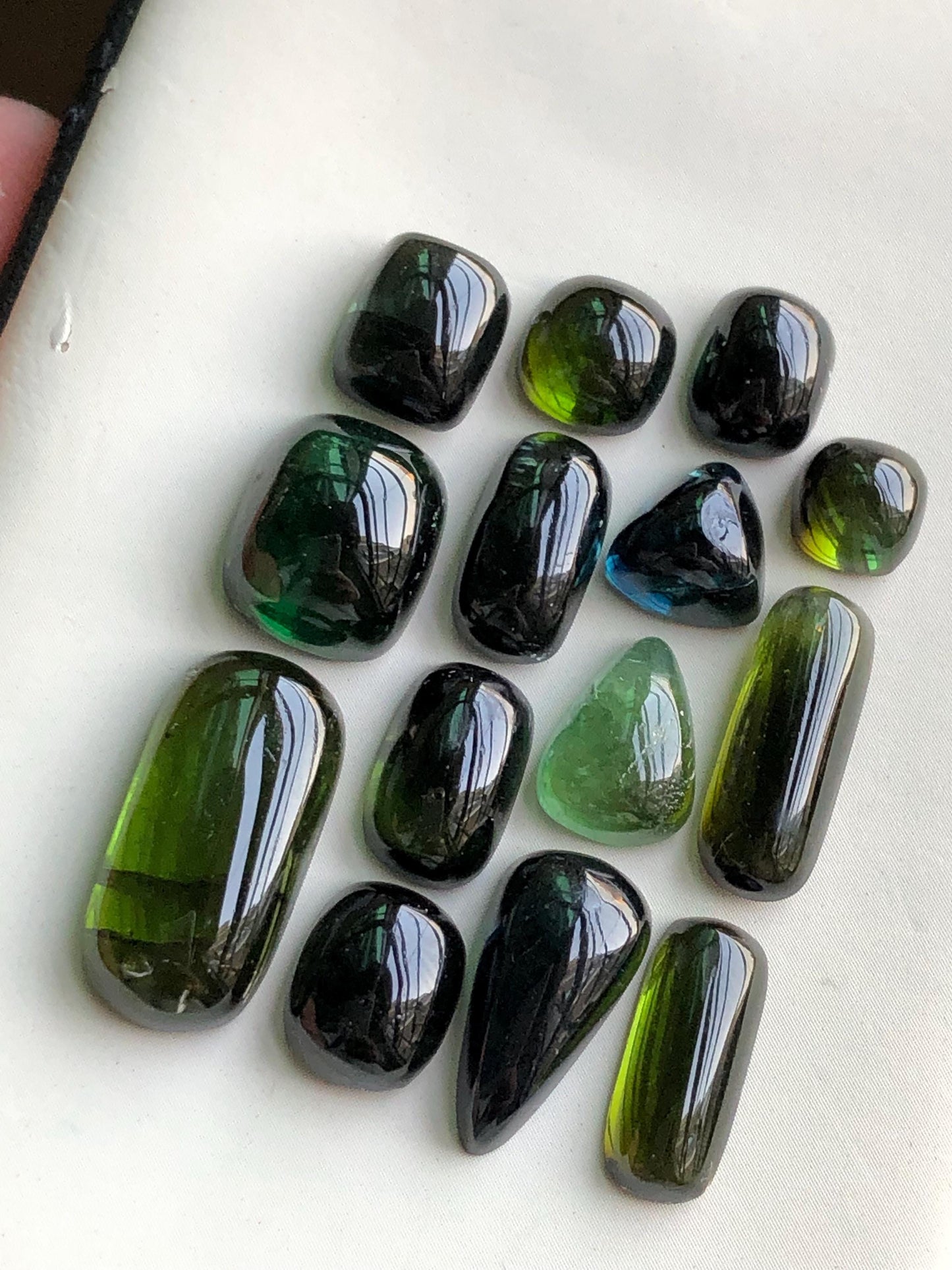 55.90 carats Dark green tourmaline cabochons lot