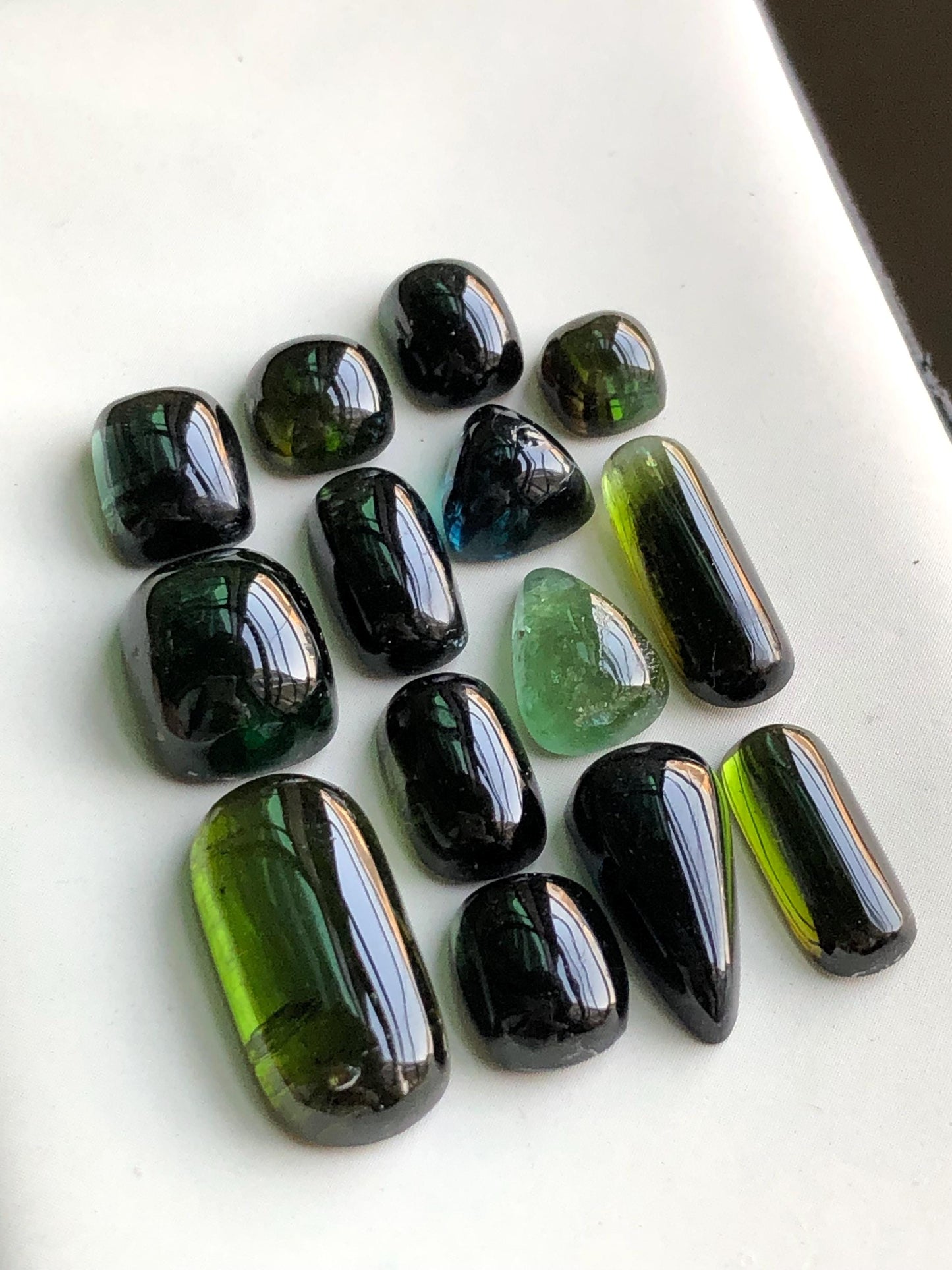 55.90 carats Dark green tourmaline cabochons lot