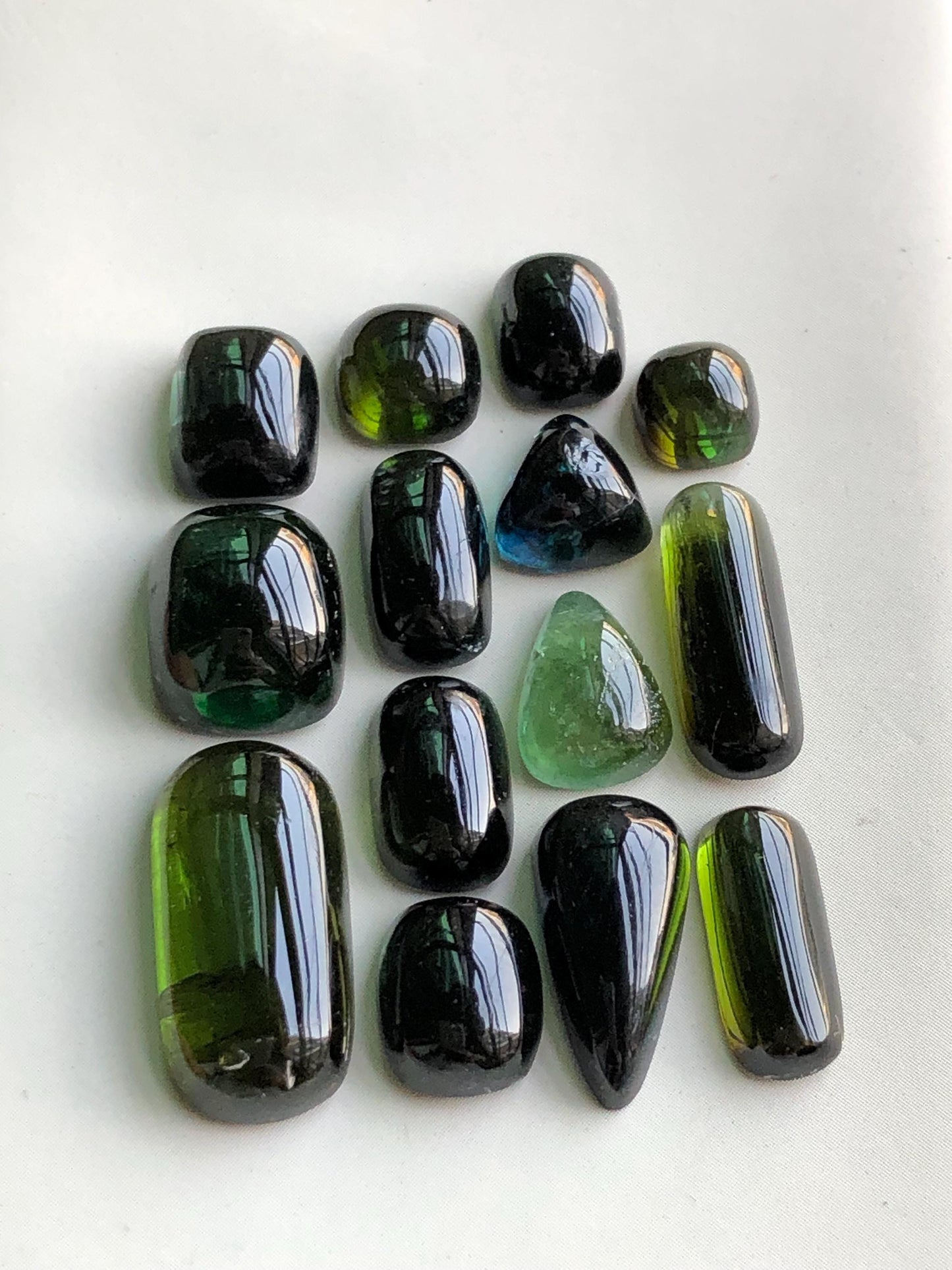 55.90 carats Dark green tourmaline cabochons lot