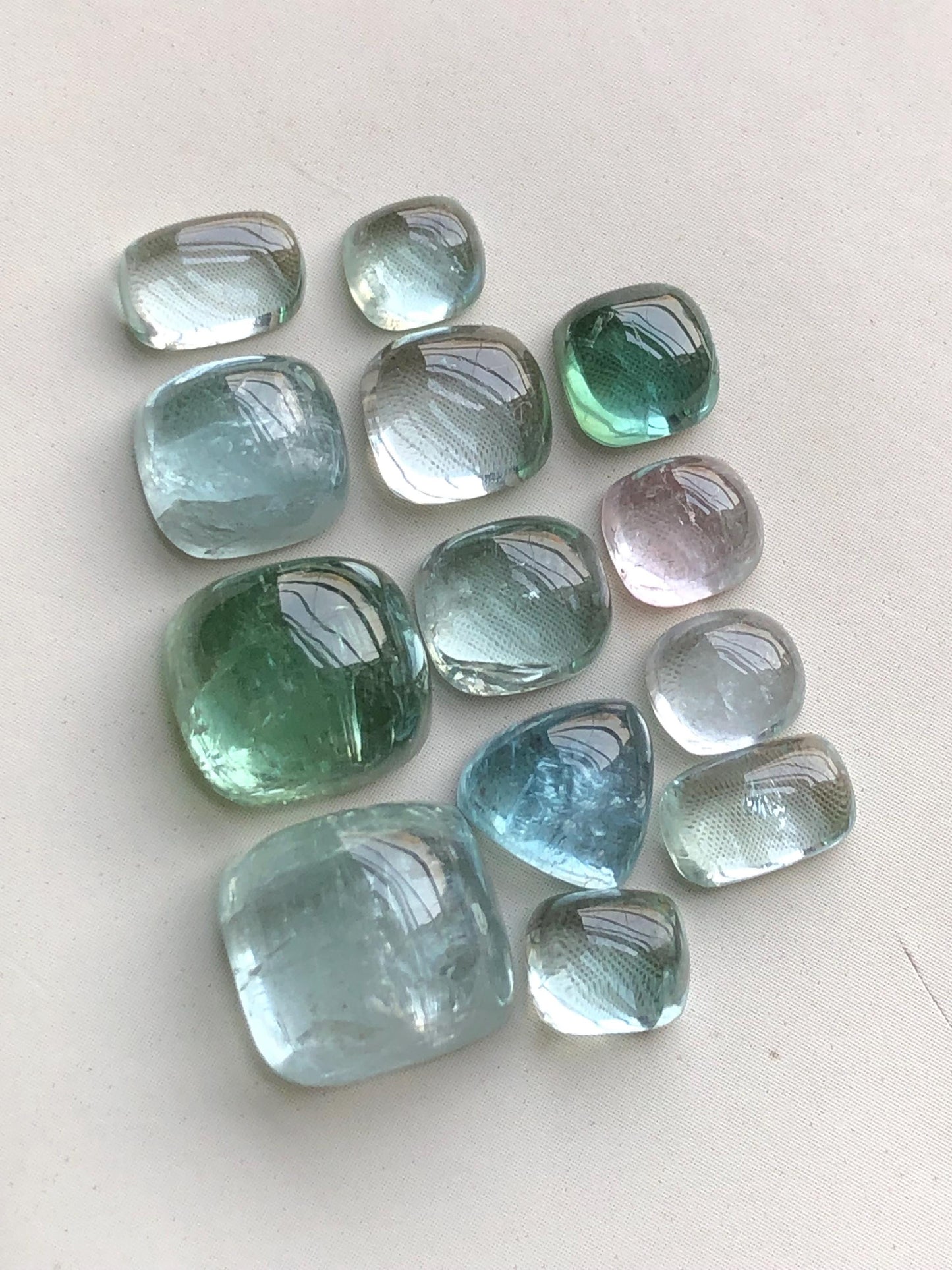 Sea foam & green tourmaline cabochons 35.50 carats