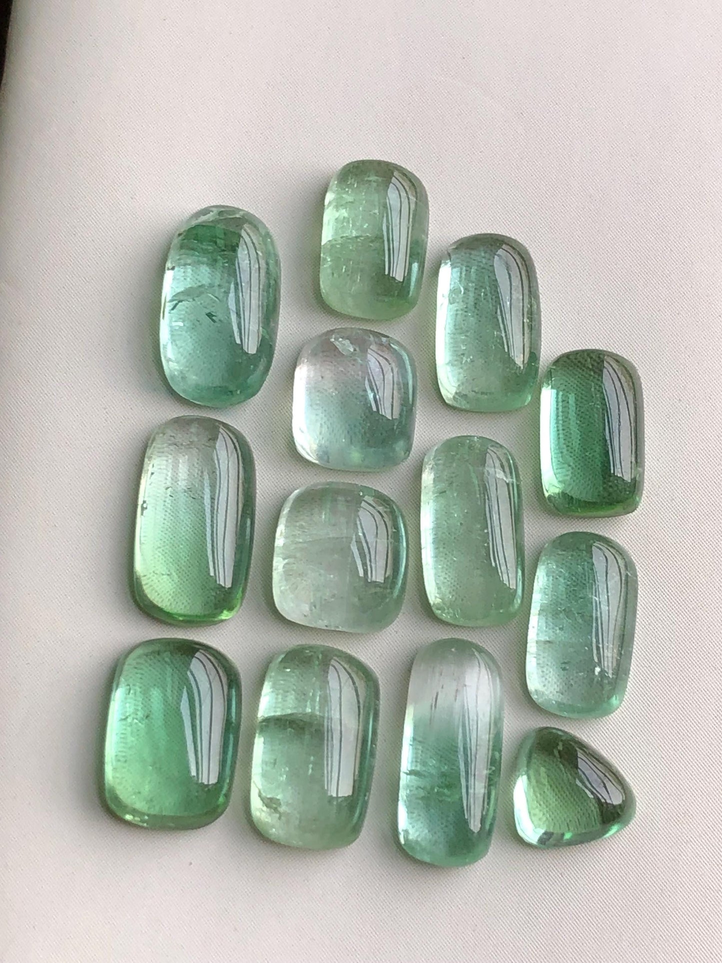 24.40 carats Lagoon green tourmaline cabochons lot