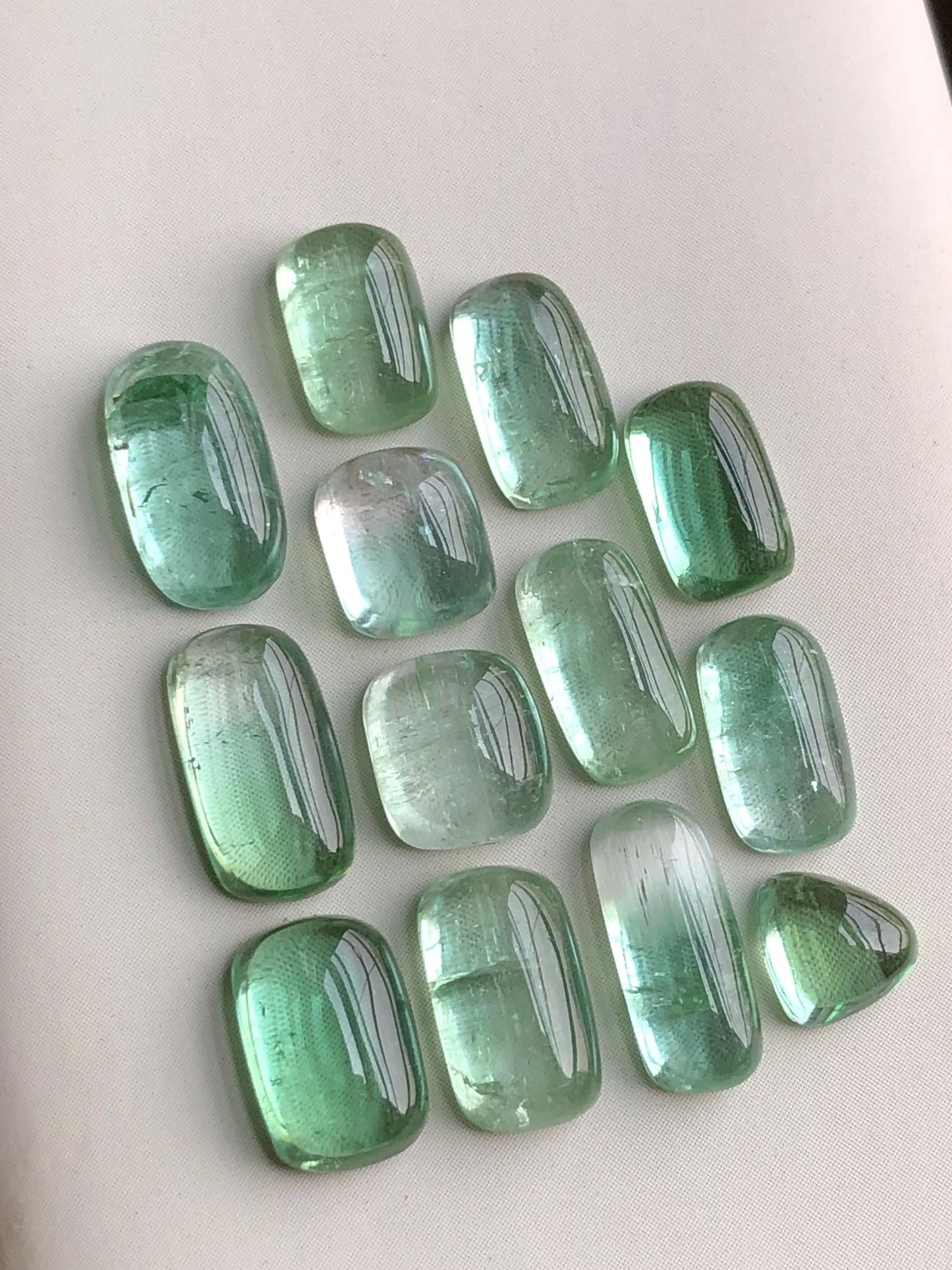 24.40 carats Lagoon green tourmaline cabochons lot