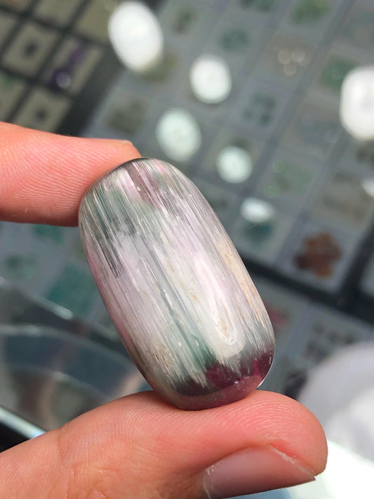 65 carat cat eye tourmaline cabochon