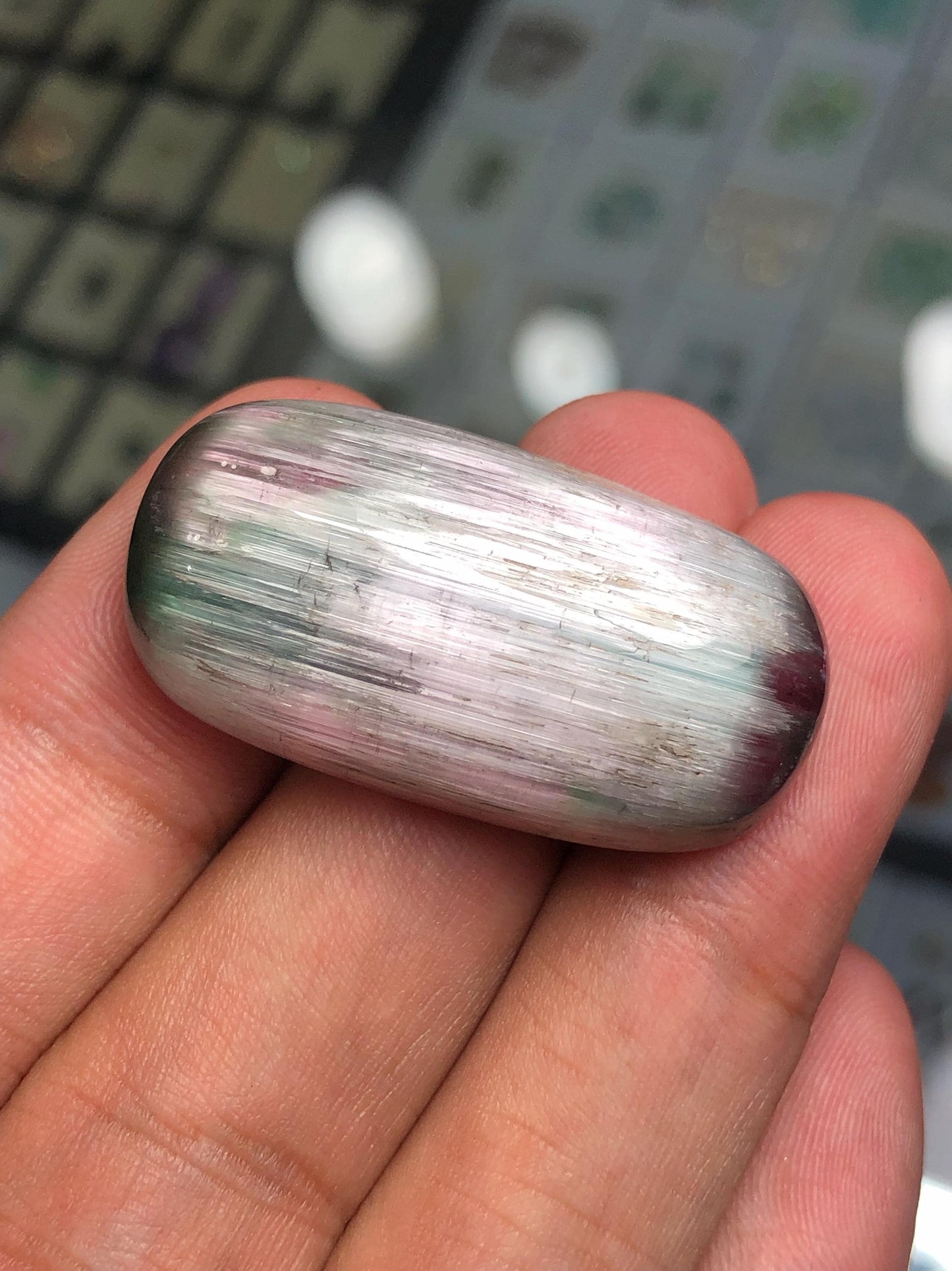 65 carat cat eye tourmaline cabochon