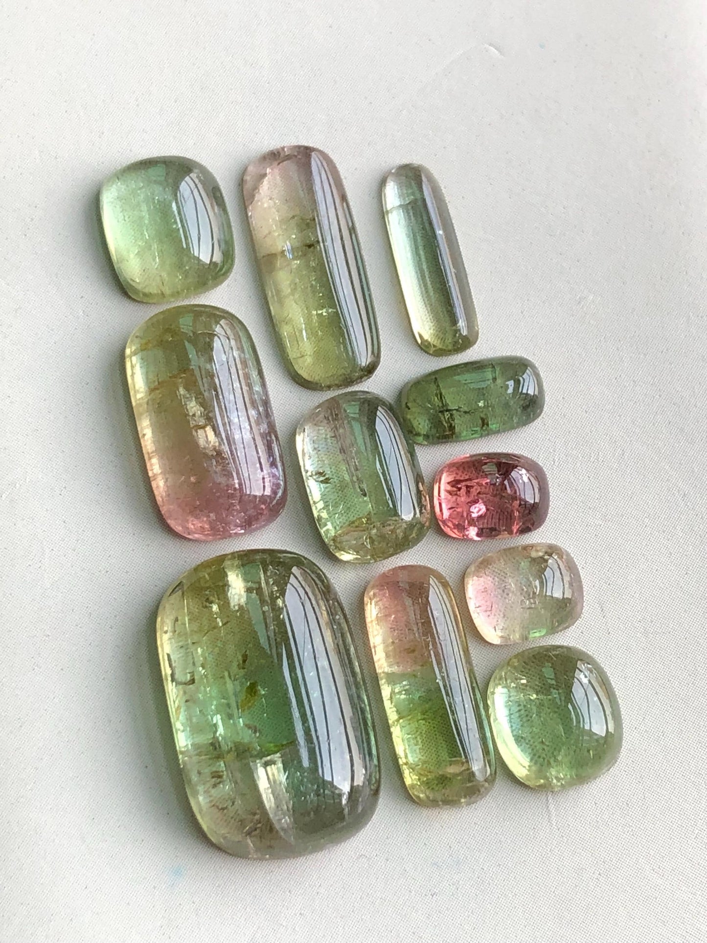 32.85 carats Bi colour tourmaline cabochons lot flat back