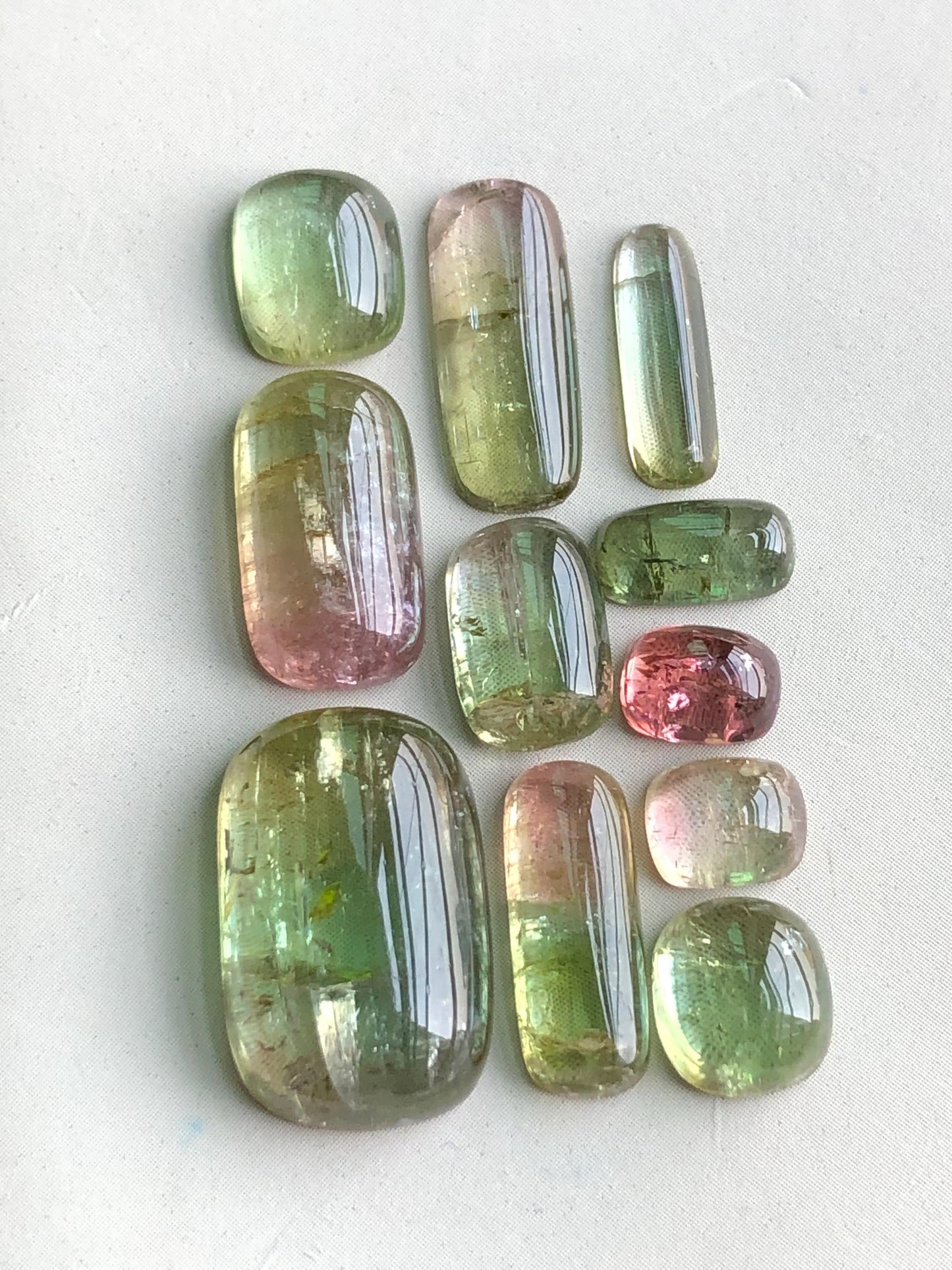 32.85 carats Bi colour tourmaline cabochons lot flat back