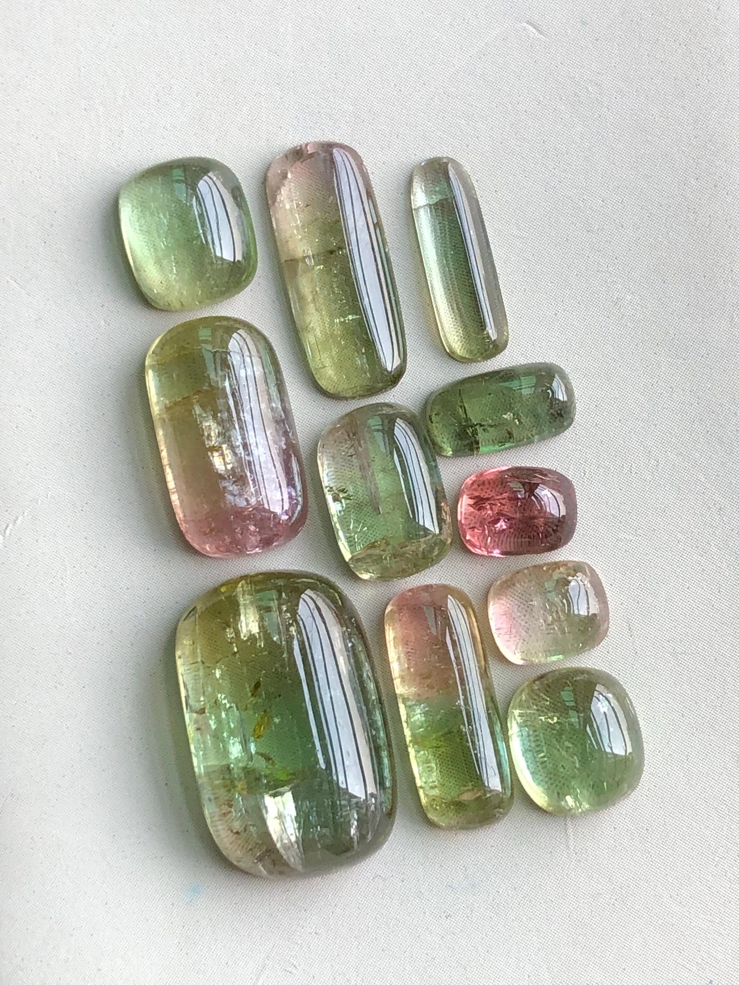 32.85 carats Bi colour tourmaline cabochons lot flat back