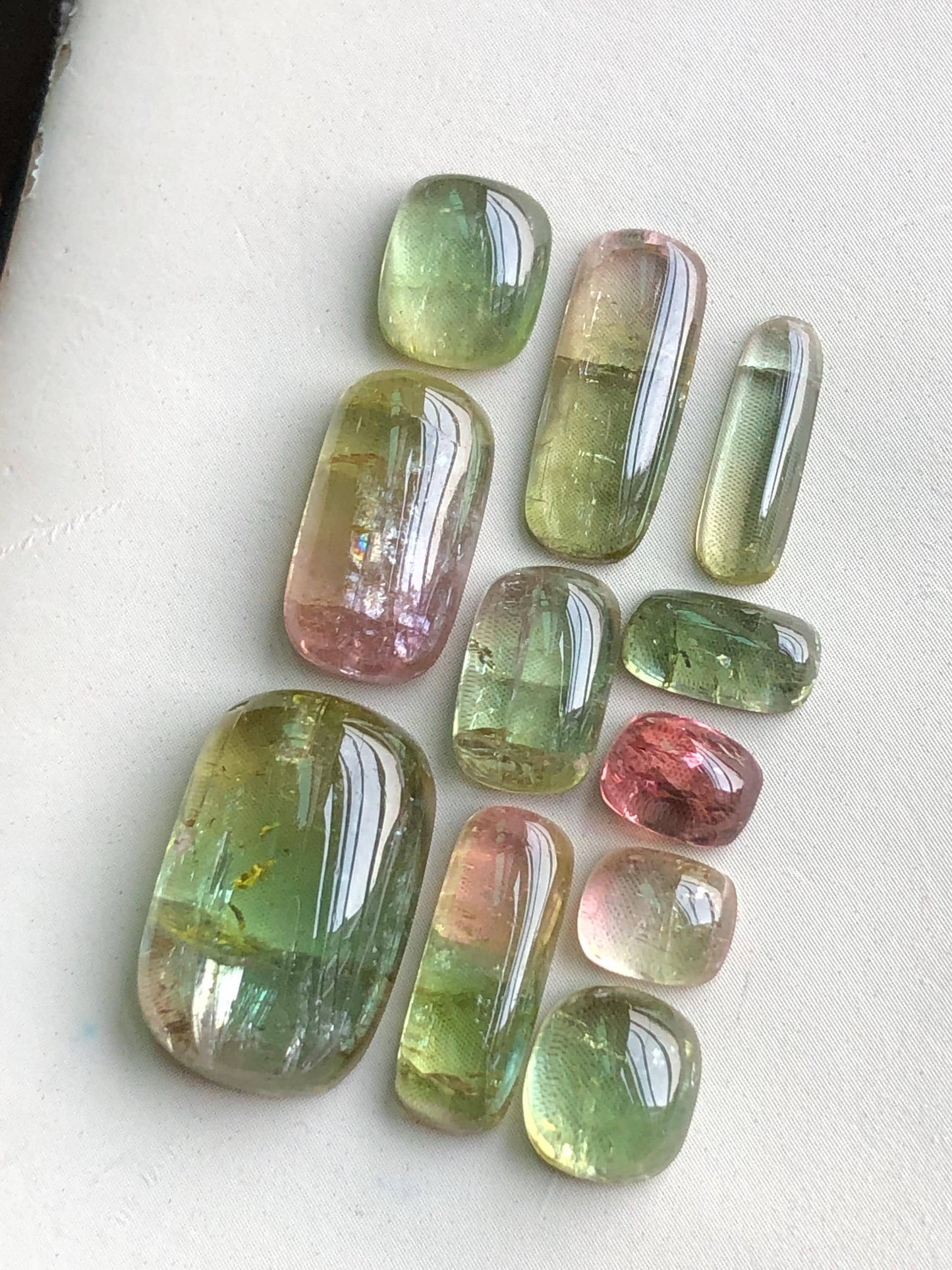 32.85 carats Bi colour tourmaline cabochons lot flat back