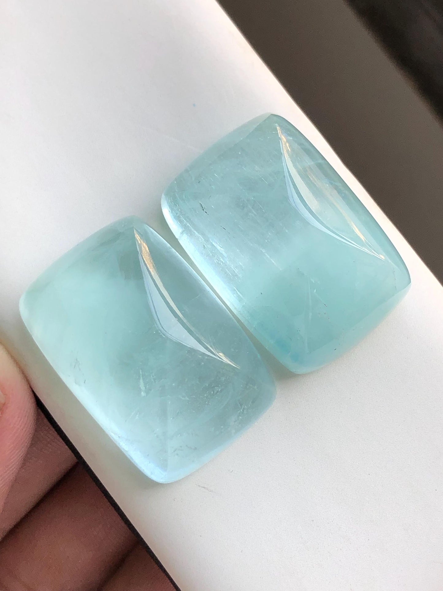 158 carat  Blue aquamarine cabochon pair sugar loaf