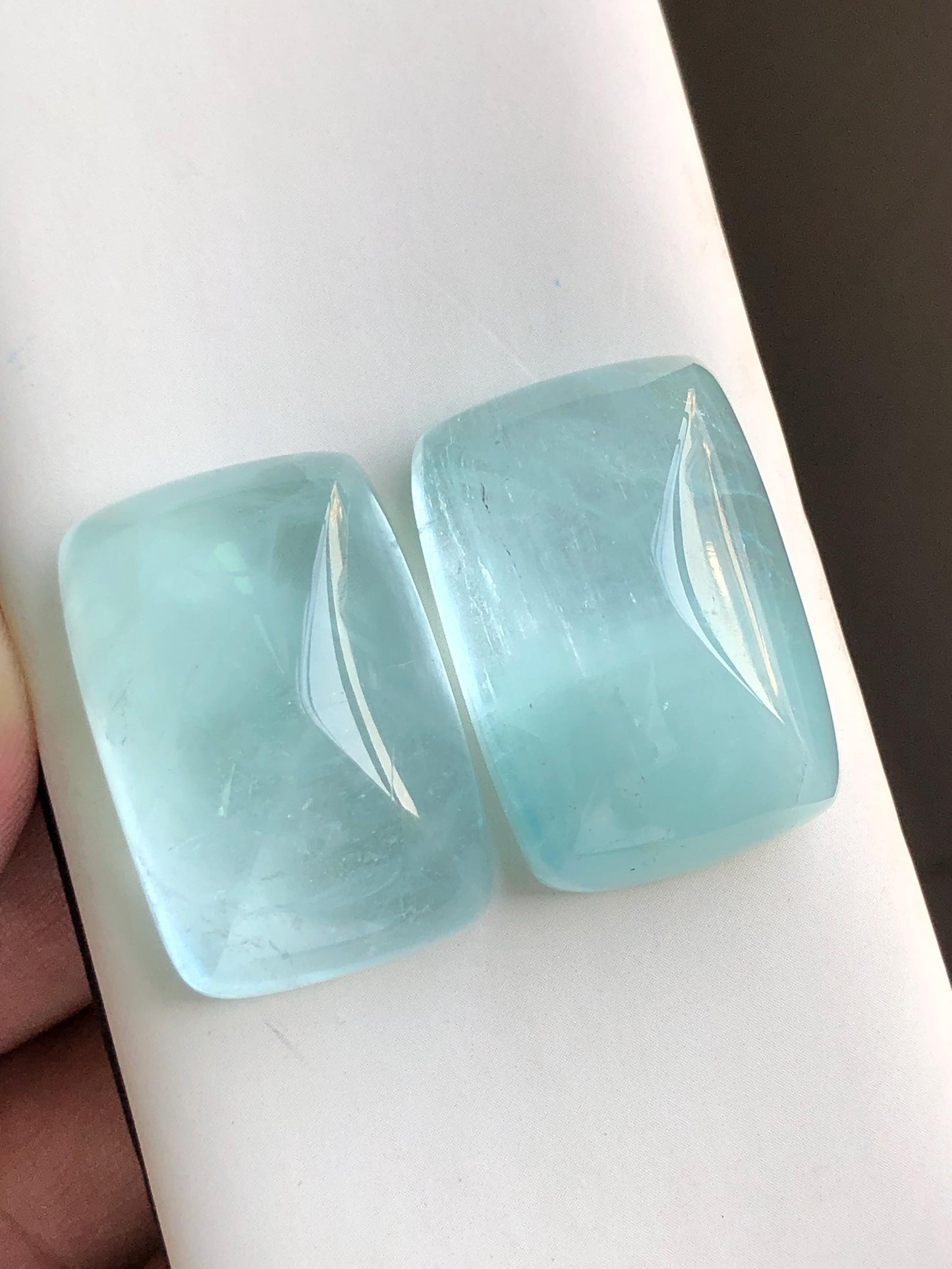 158 carat  Blue aquamarine cabochon pair sugar loaf