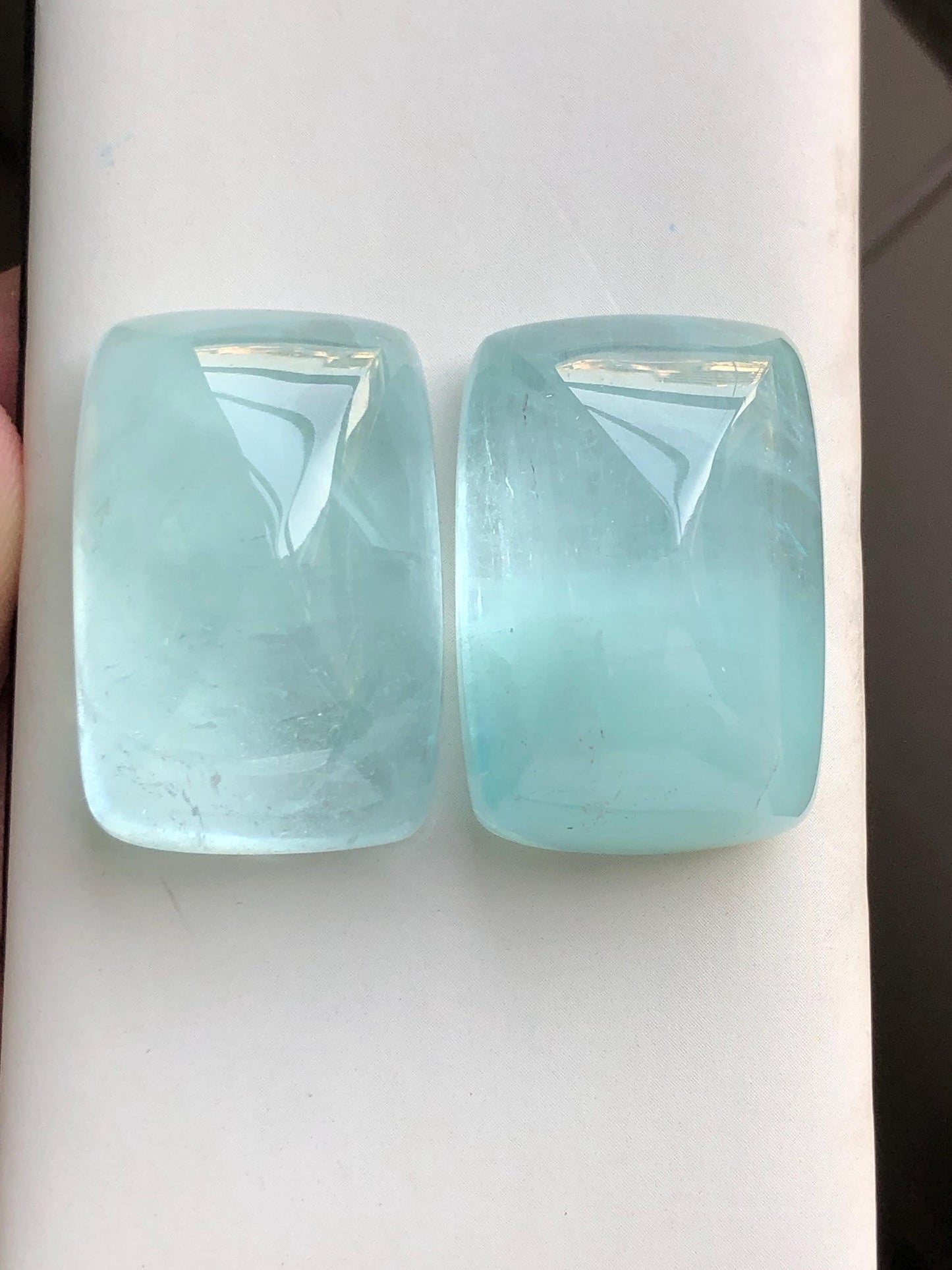 158 carat  Blue aquamarine cabochon pair sugar loaf