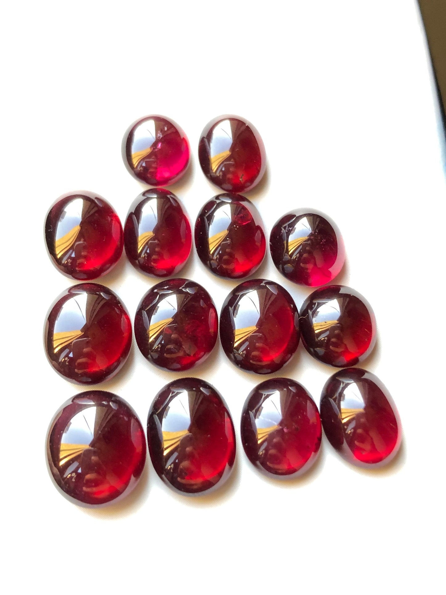 83.60 carats natural rhodolite garnet cabochons smaller 10mm longer 13mm length size