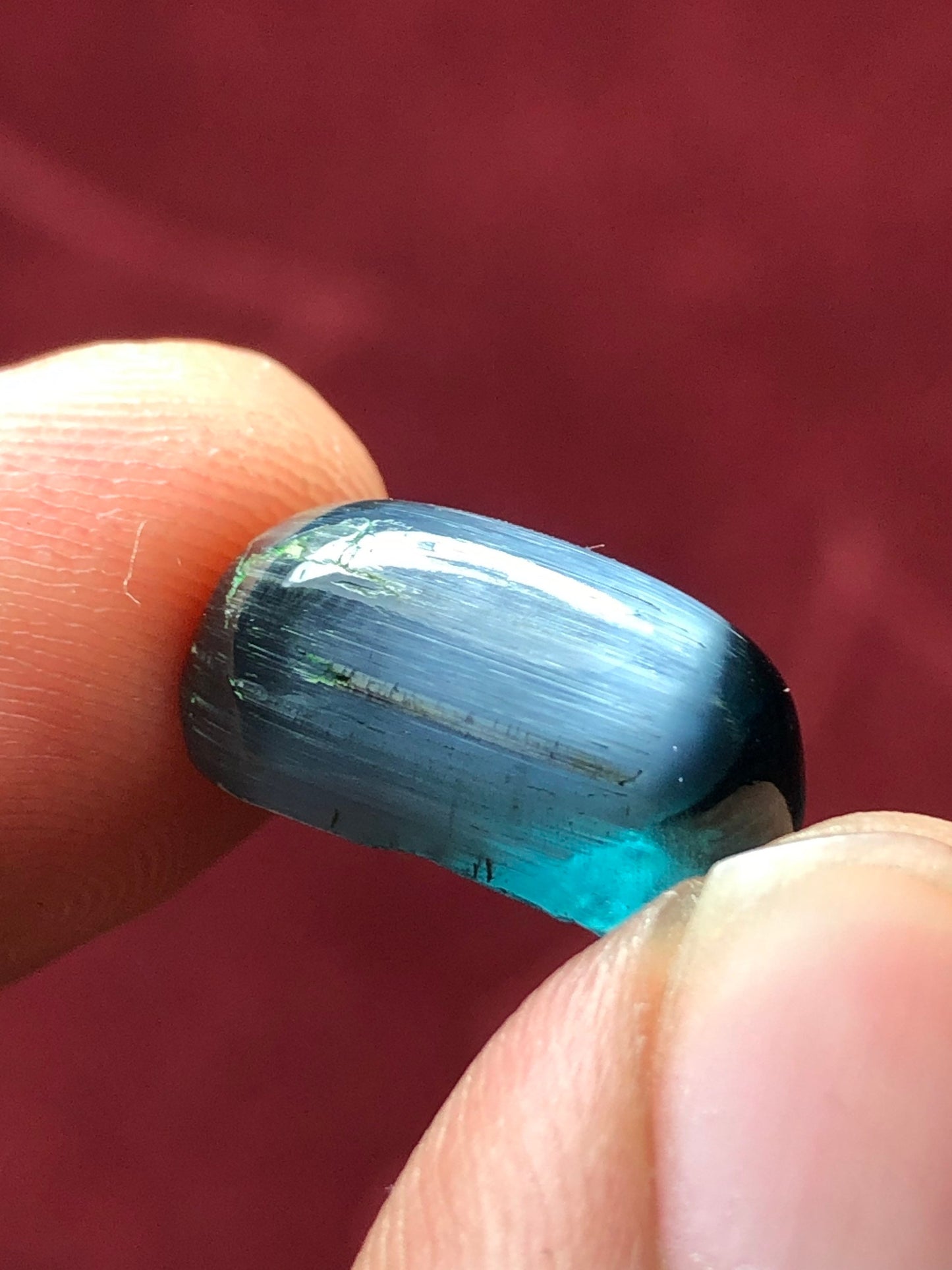 11 carat string cats eye tourmaline cabochon available 16*9*7mm is dimension