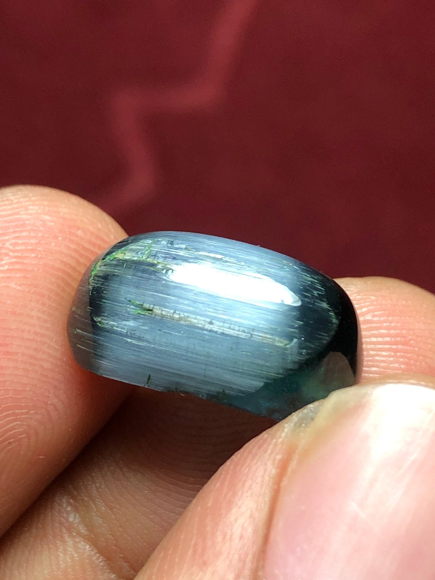 11 carat string cats eye tourmaline cabochon available 16*9*7mm is dimension