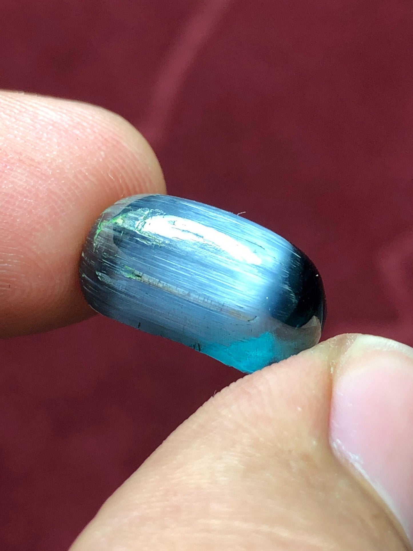 11 carat string cats eye tourmaline cabochon available 16*9*7mm is dimension