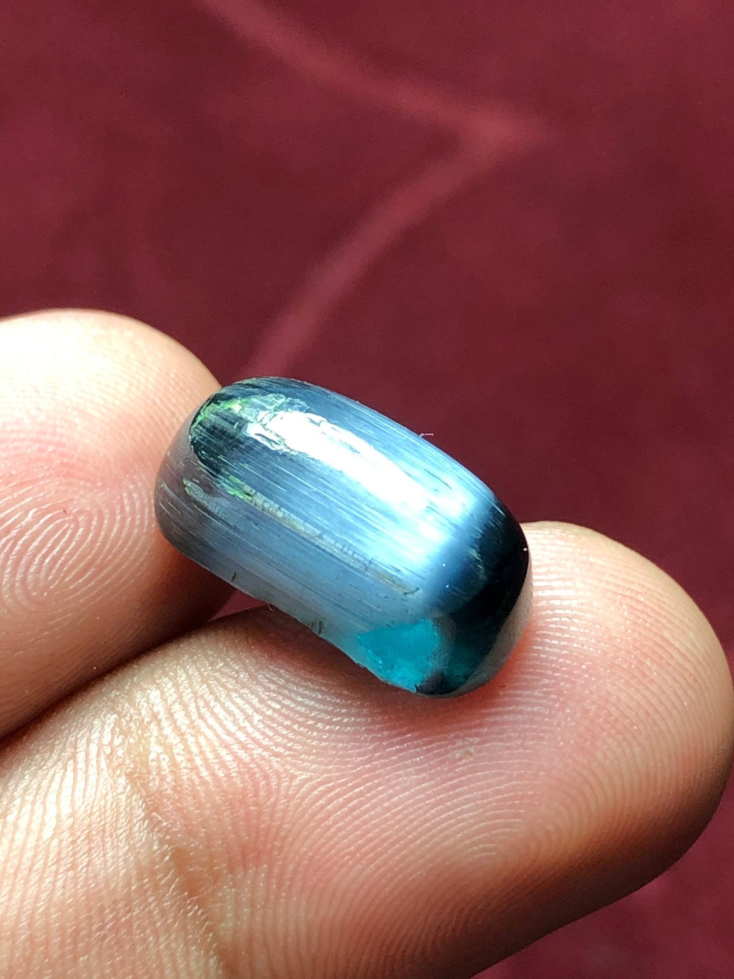 11 carat string cats eye tourmaline cabochon available 16*9*7mm is dimension