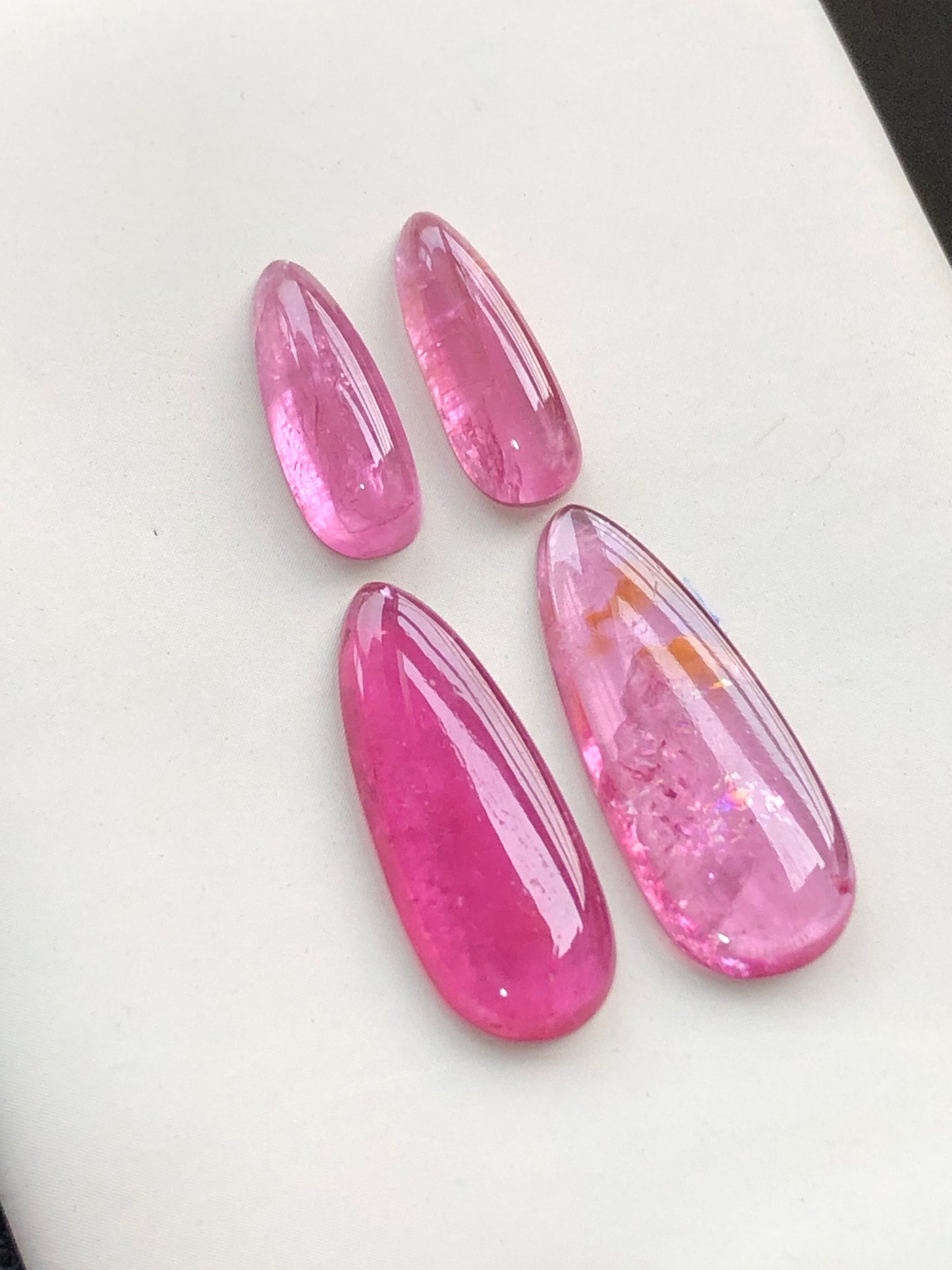 Hot pink tourmaline cabochon pairs 18.70 carats