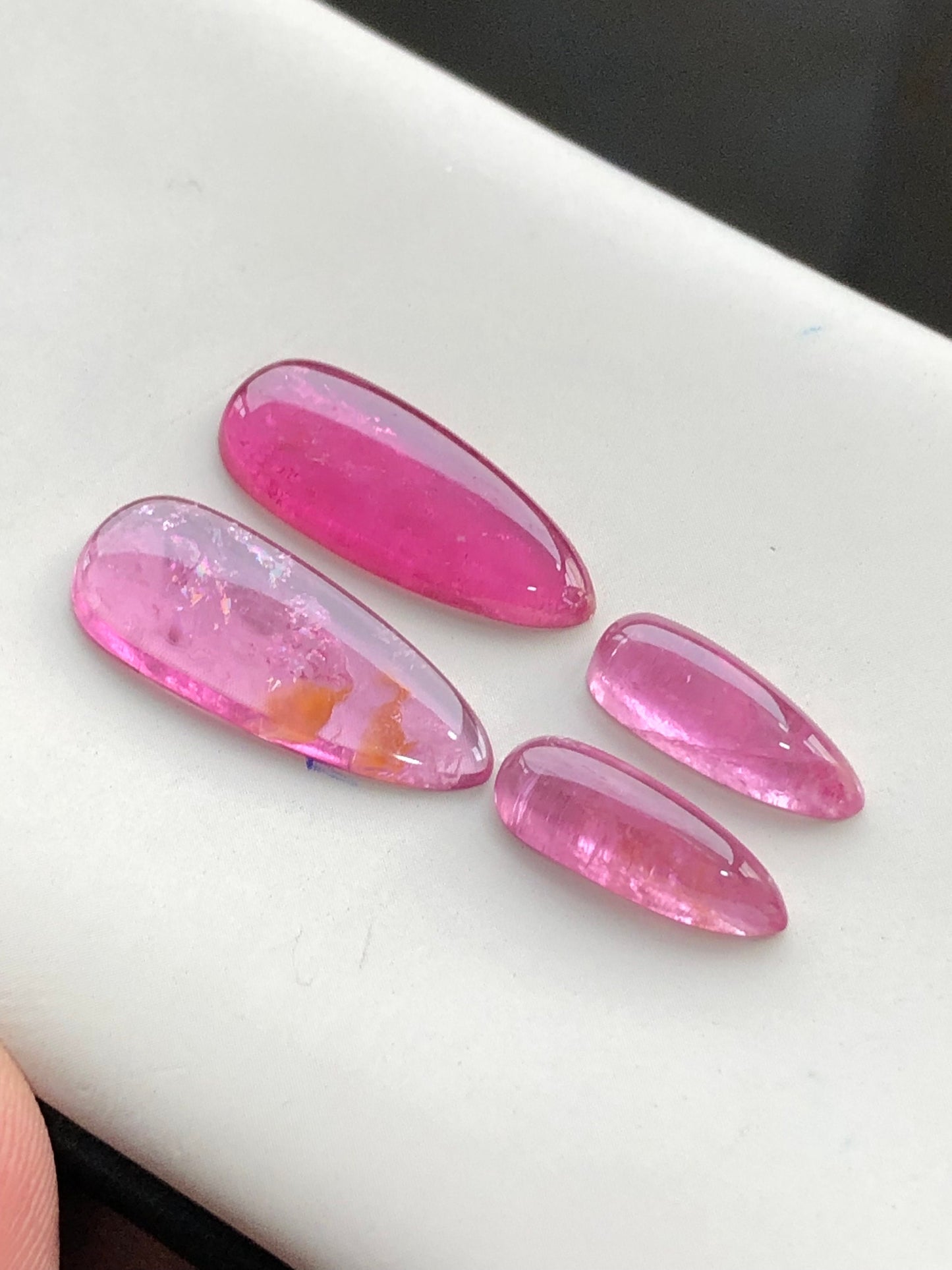 Hot pink tourmaline cabochon pairs 18.70 carats