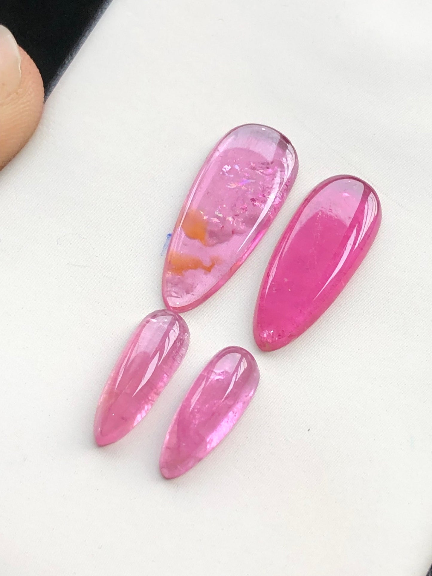 Hot pink tourmaline cabochon pairs 18.70 carats