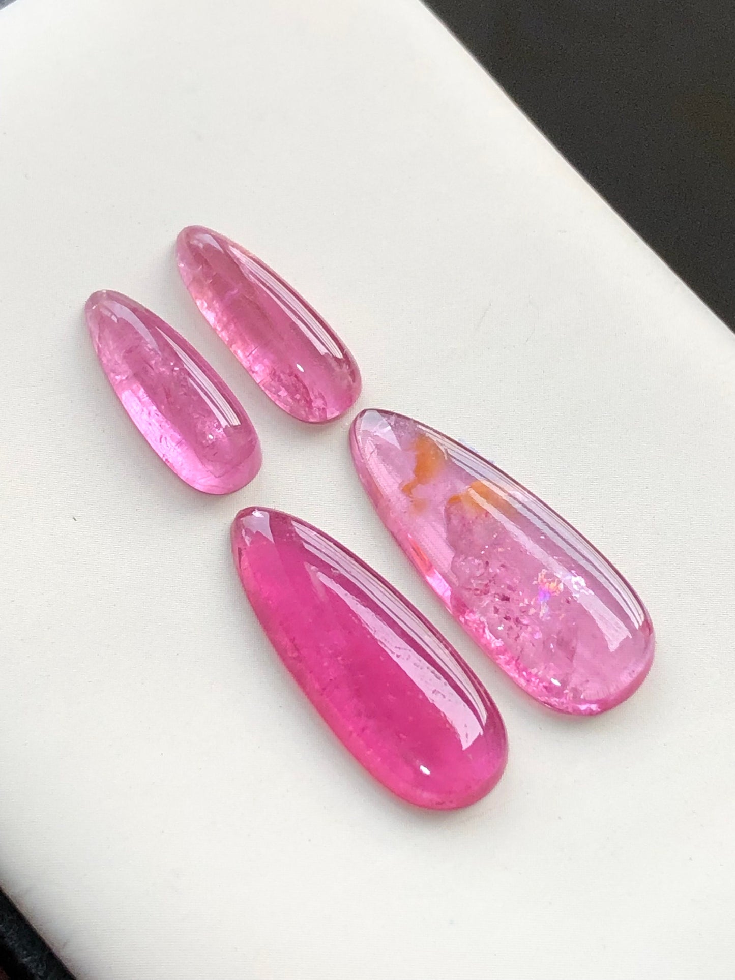 Hot pink tourmaline cabochon pairs 18.70 carats