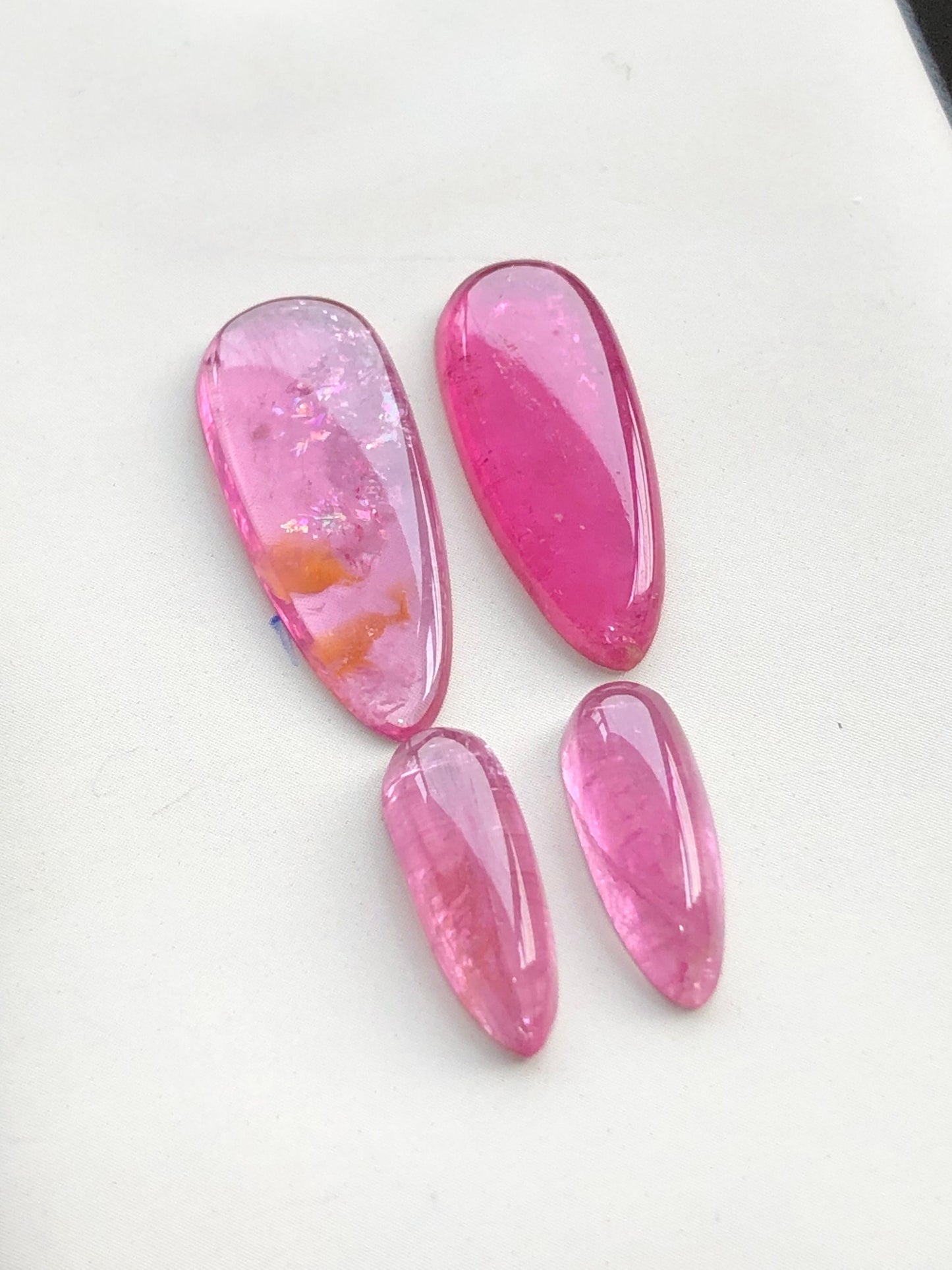 Hot pink tourmaline cabochon pairs 18.70 carats