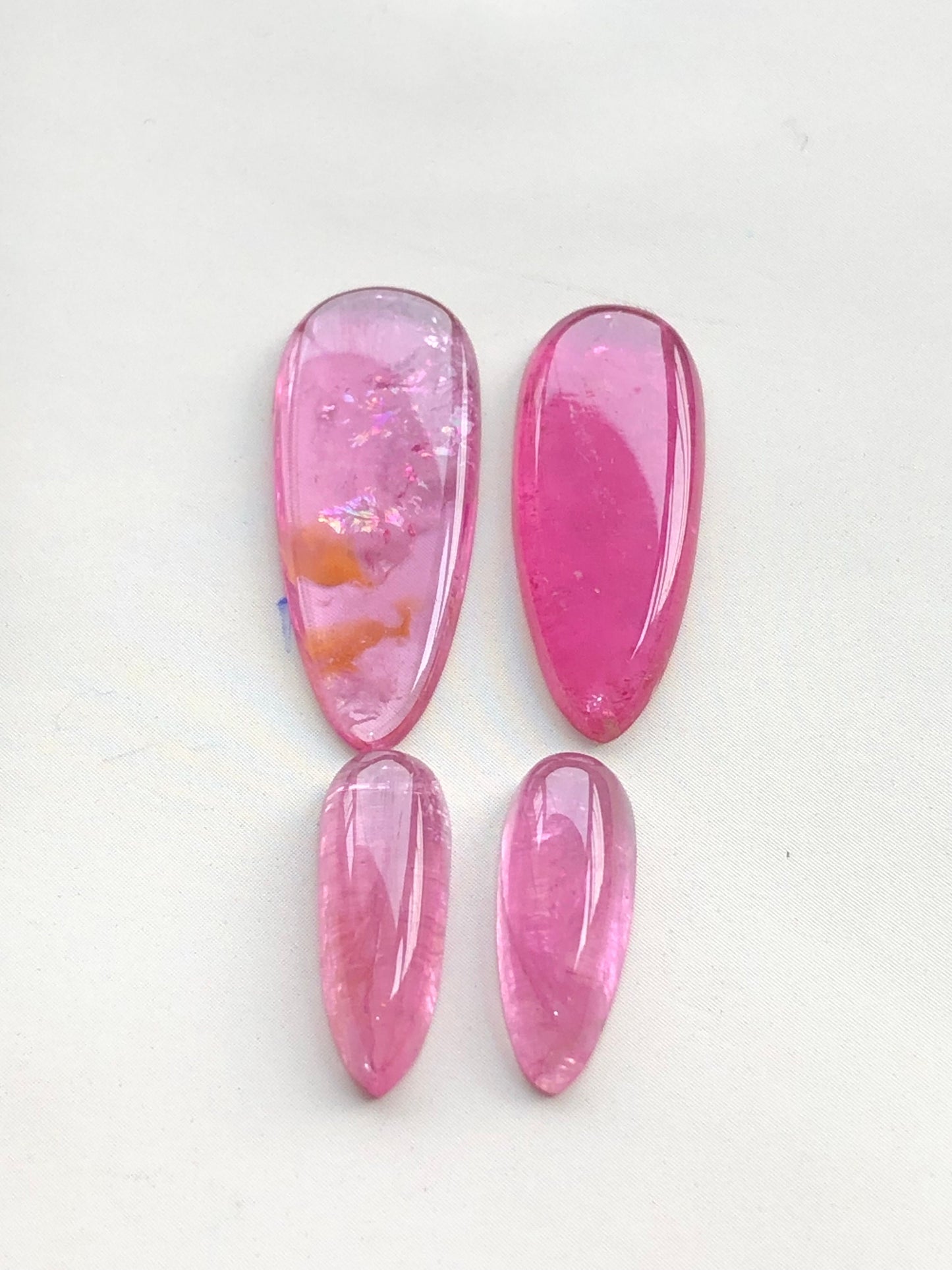 Hot pink tourmaline cabochon pairs 18.70 carats