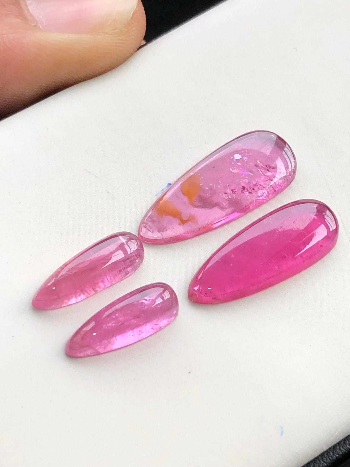 Hot pink tourmaline cabochon pairs 18.70 carats