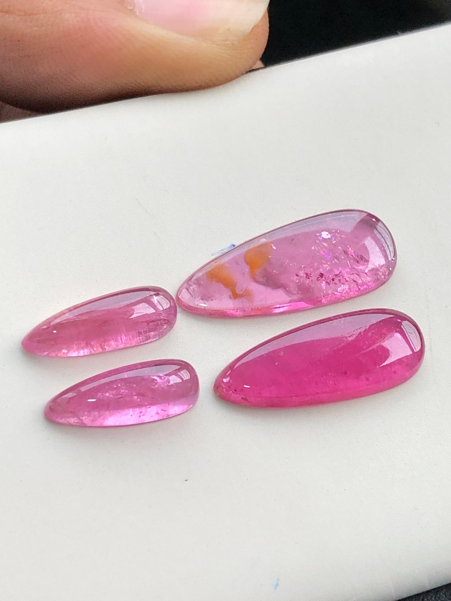 Hot pink tourmaline cabochon pairs 18.70 carats