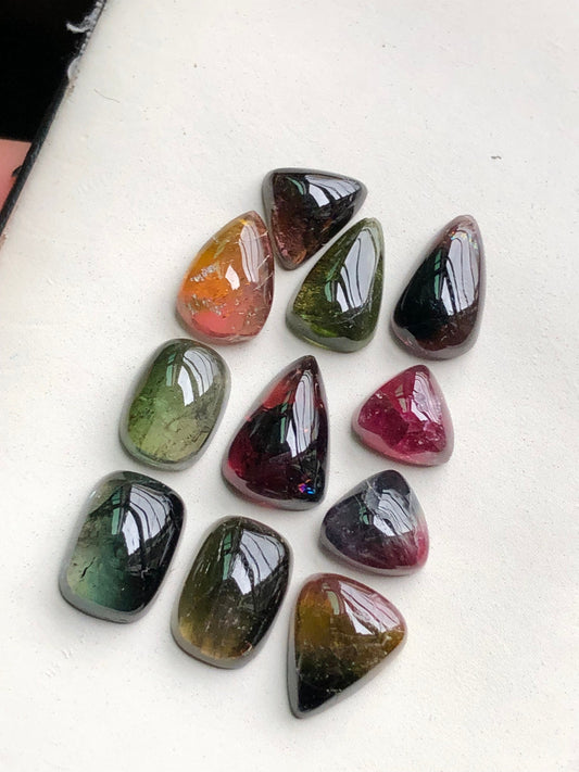 Bi colour tourmaline cabochons lot 34 carats