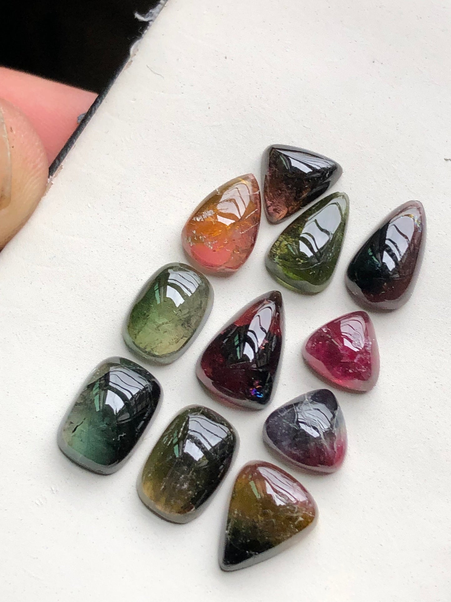 Bi colour tourmaline cabochons lot 34 carats