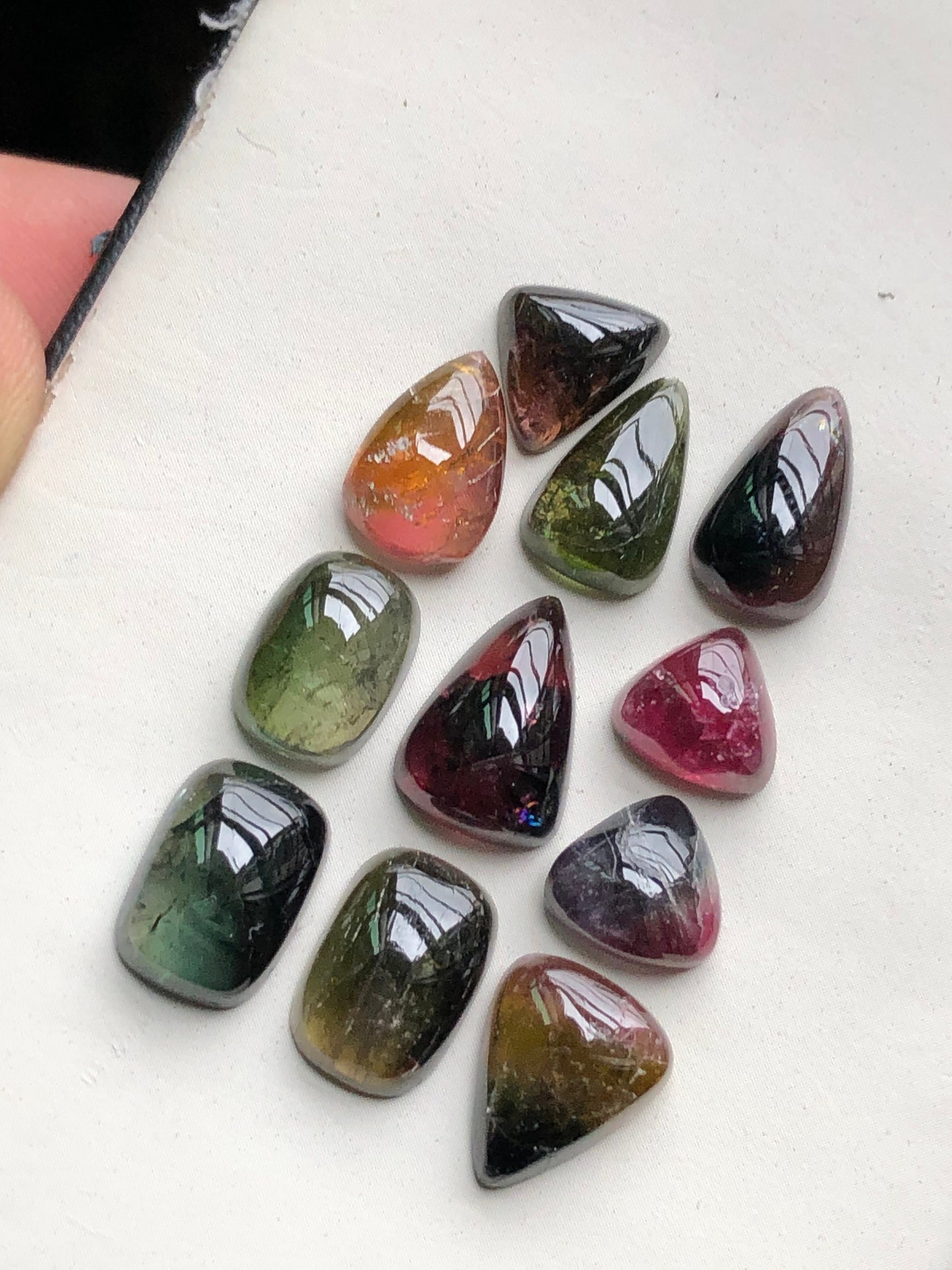 Bi colour tourmaline cabochons lot 34 carats